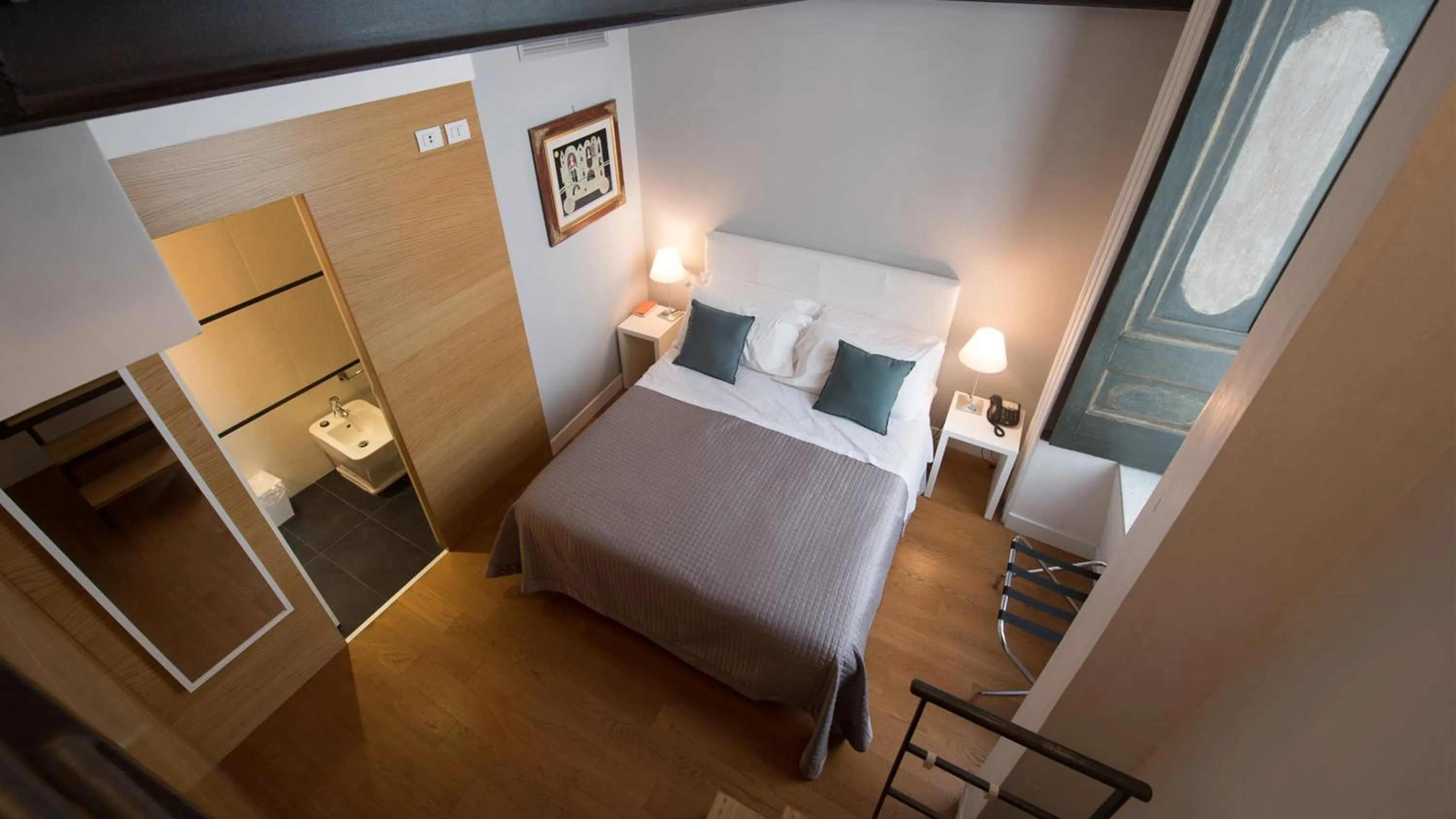 Bed in Santa Chiara Boutique Hotel
