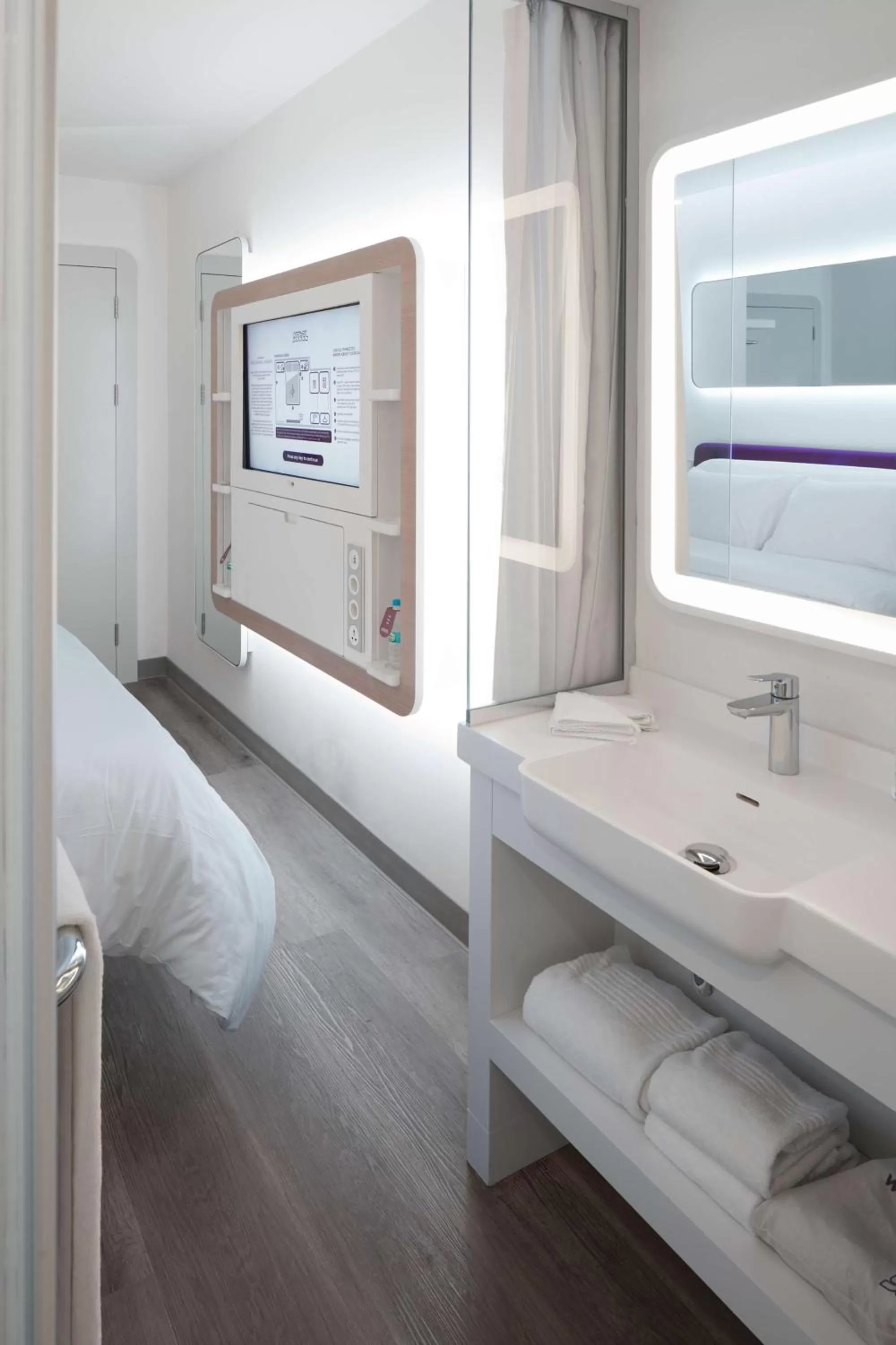 Bathroom, Bed in YOTELAIR Istanbul Airport, Duty free - International Transit area