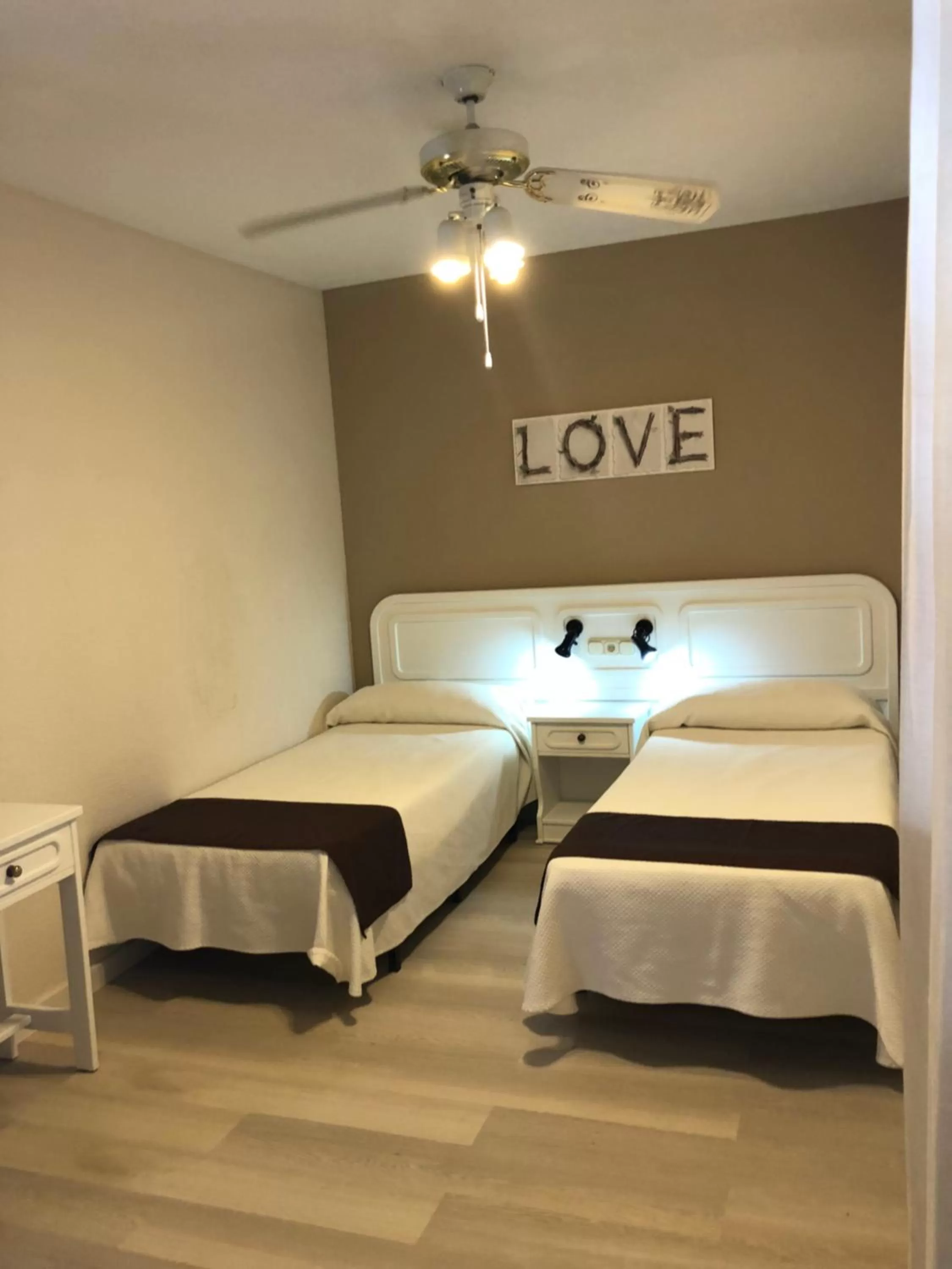 Bed in Regency Torviscas Apartments and Suites