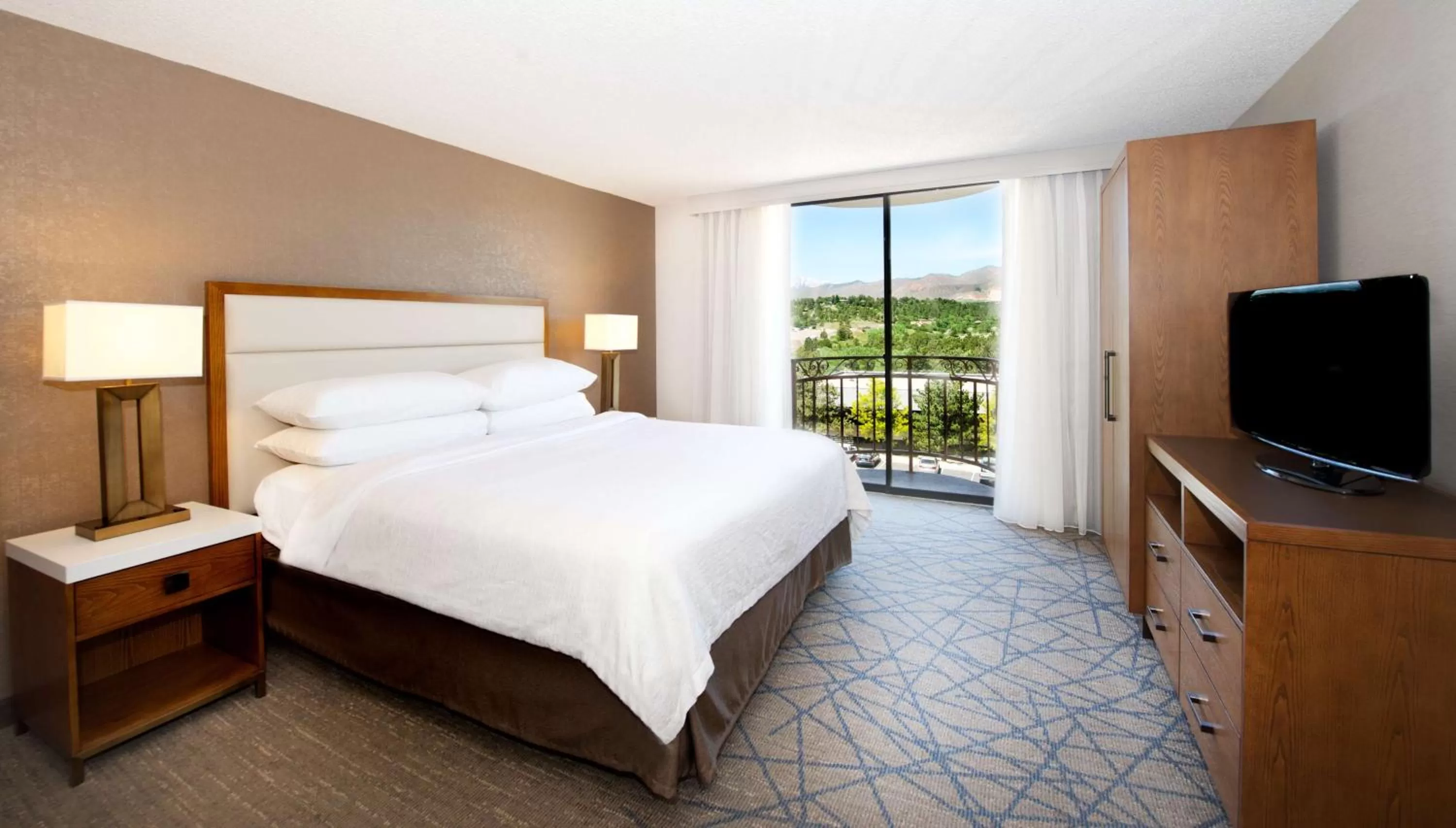 Bed in Embassy Suites by Hilton Colorado Springs