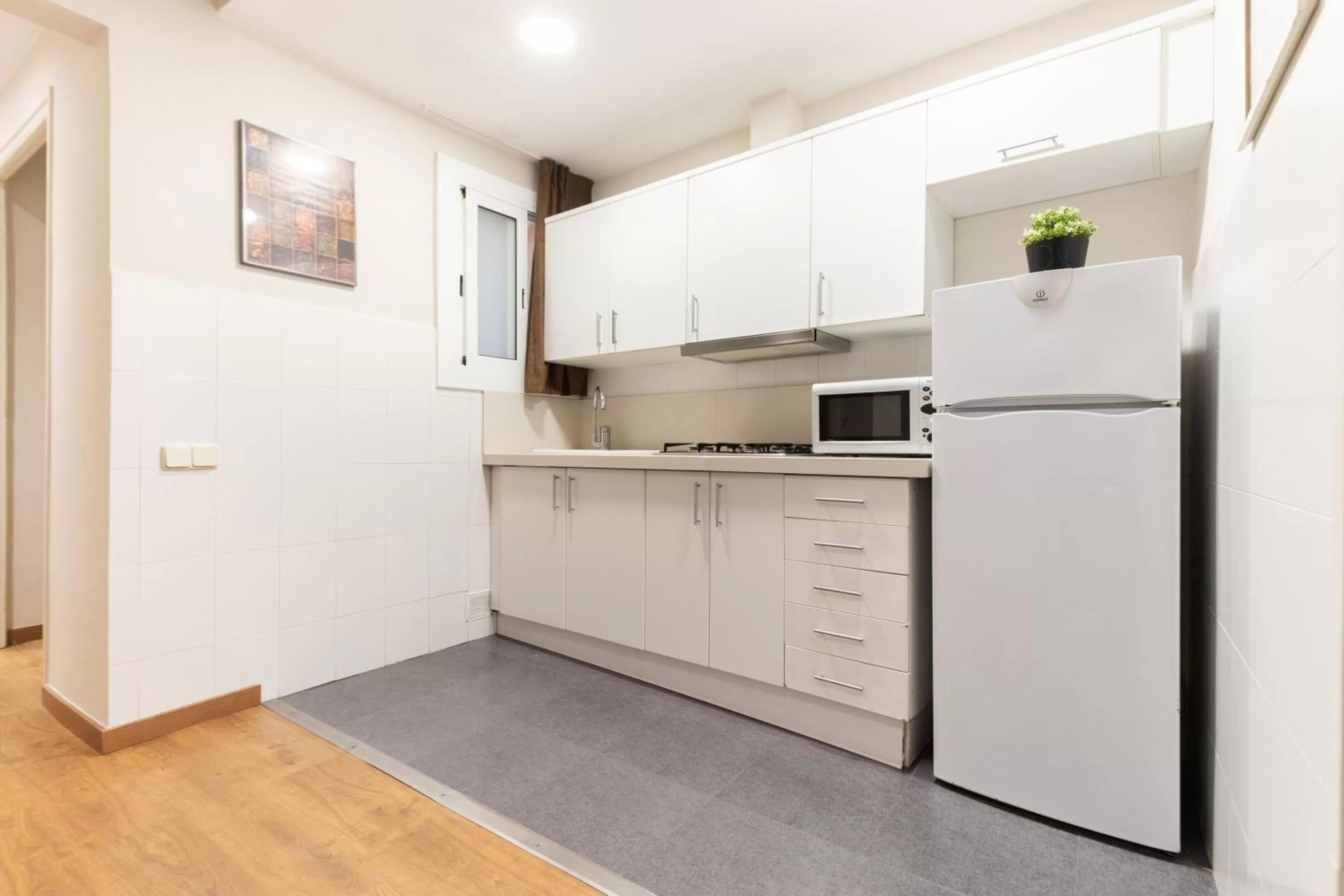 Kitchen or kitchenette in Atica Apartments - by Weflating