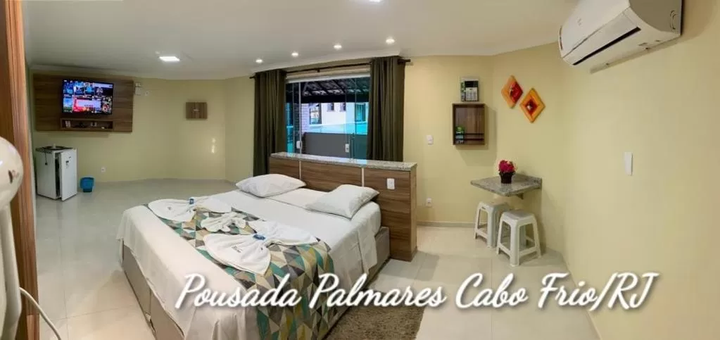 Bed in Pousada Palmares