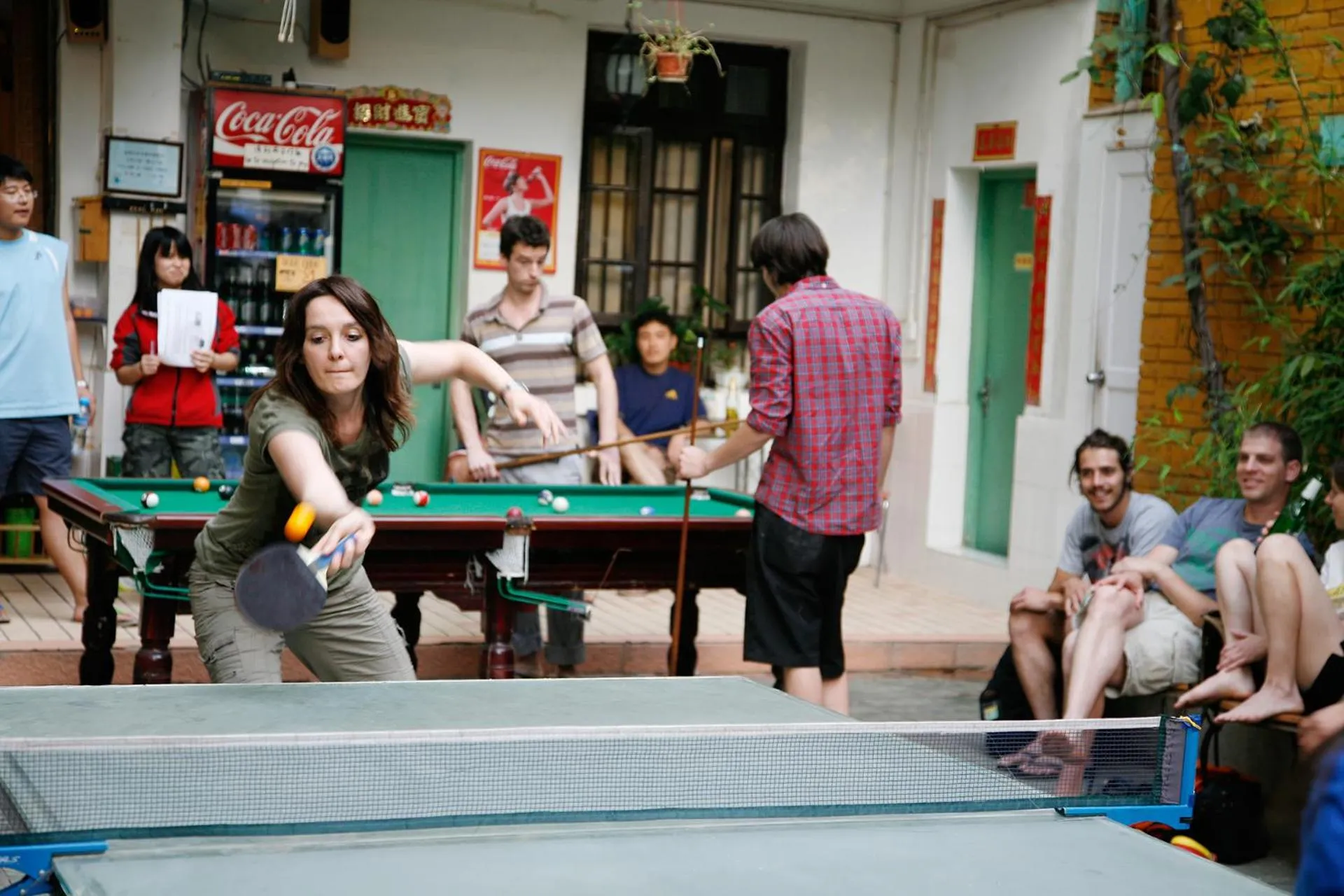 Garden in The Cloudland International Youth Hostel Close to the city center,15 min walks to the subway, Close to the night market, old street, green lake, English-speaking service, free Activity convenient payment and visa cards are accepted