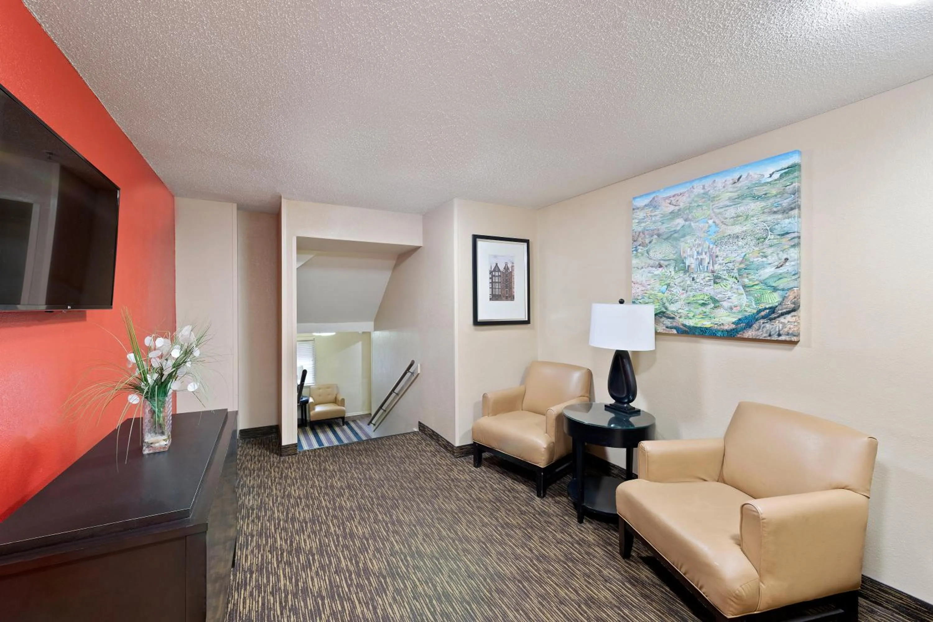 Communal lounge/ TV room in Extended Stay America Select Suites - Charlotte - Tyvola Rd - Executive Park