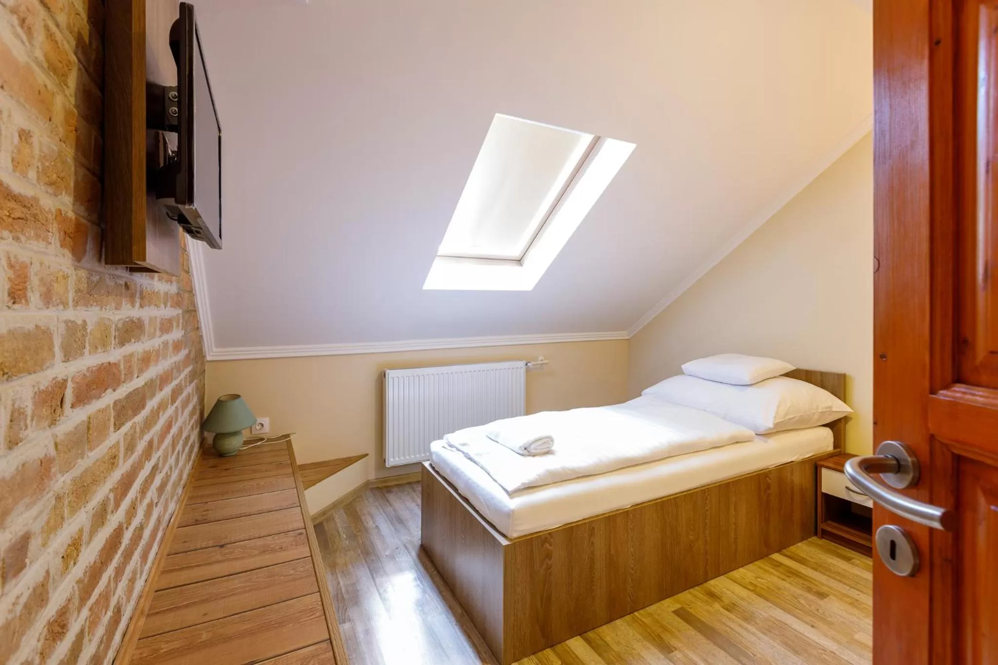 Bed in Central Panzió Gyula