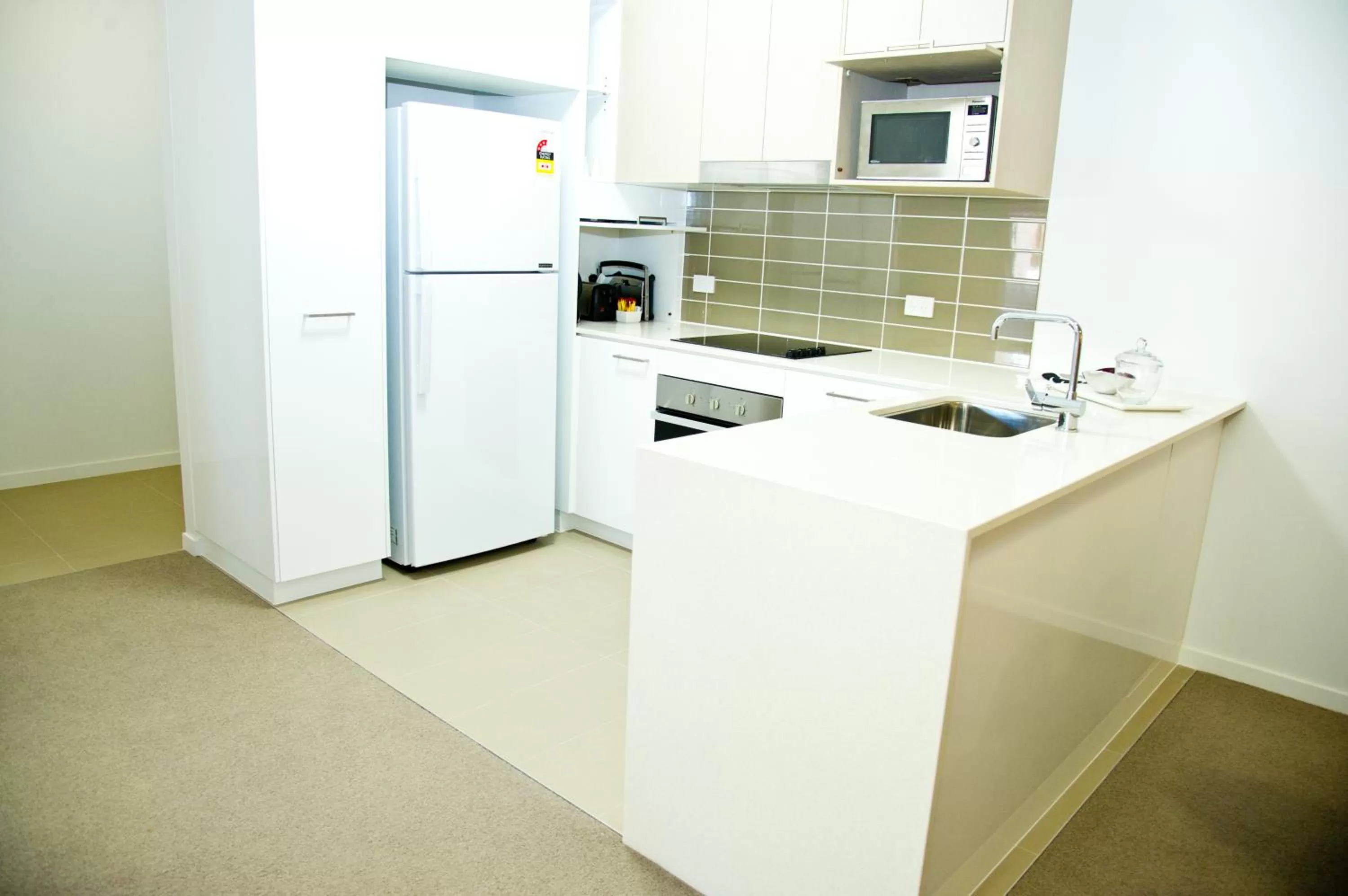 Kitchen or kitchenette in Jacana Apartments