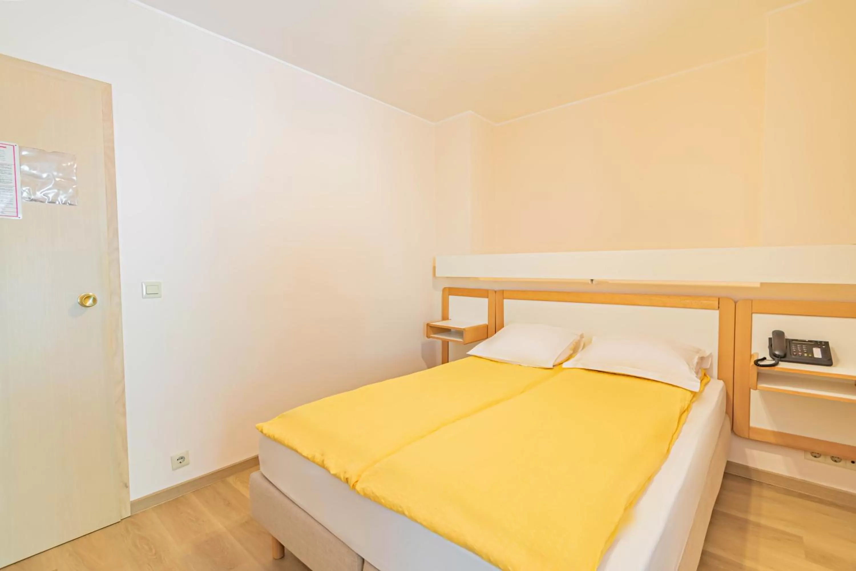 Bed in Hotel Le Postillon