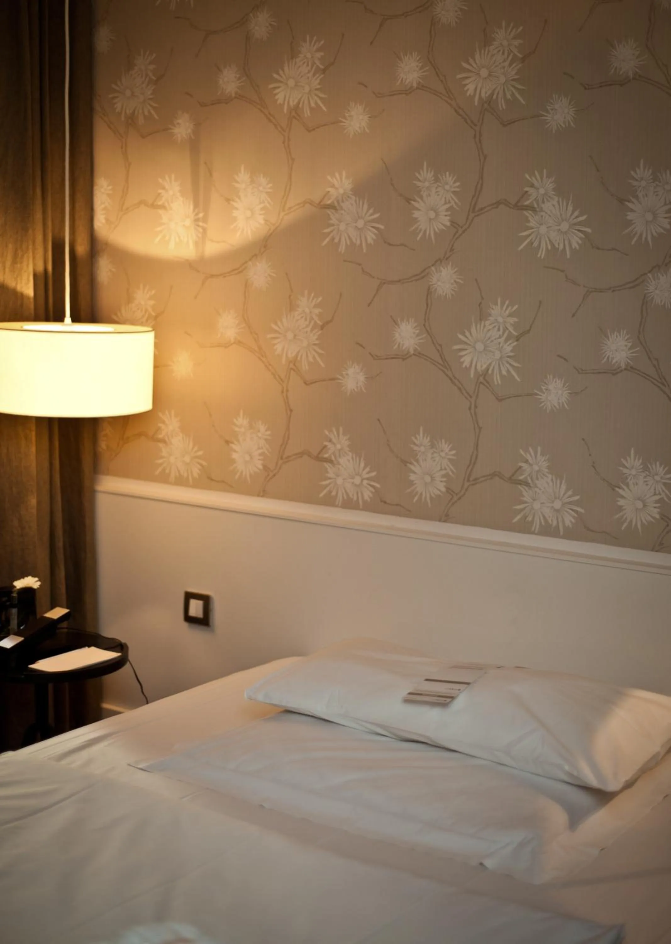 Bed in CORTIINA Hotel