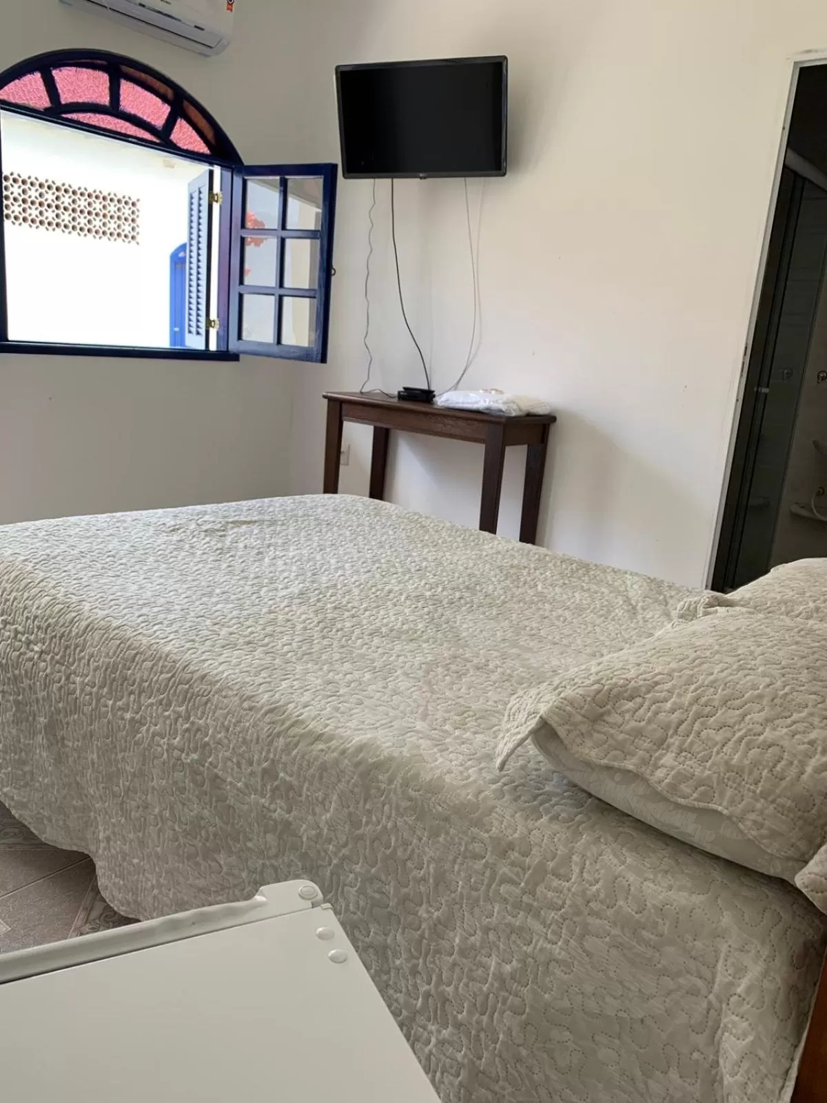 Bed in Pousada Fazendinha Unamar