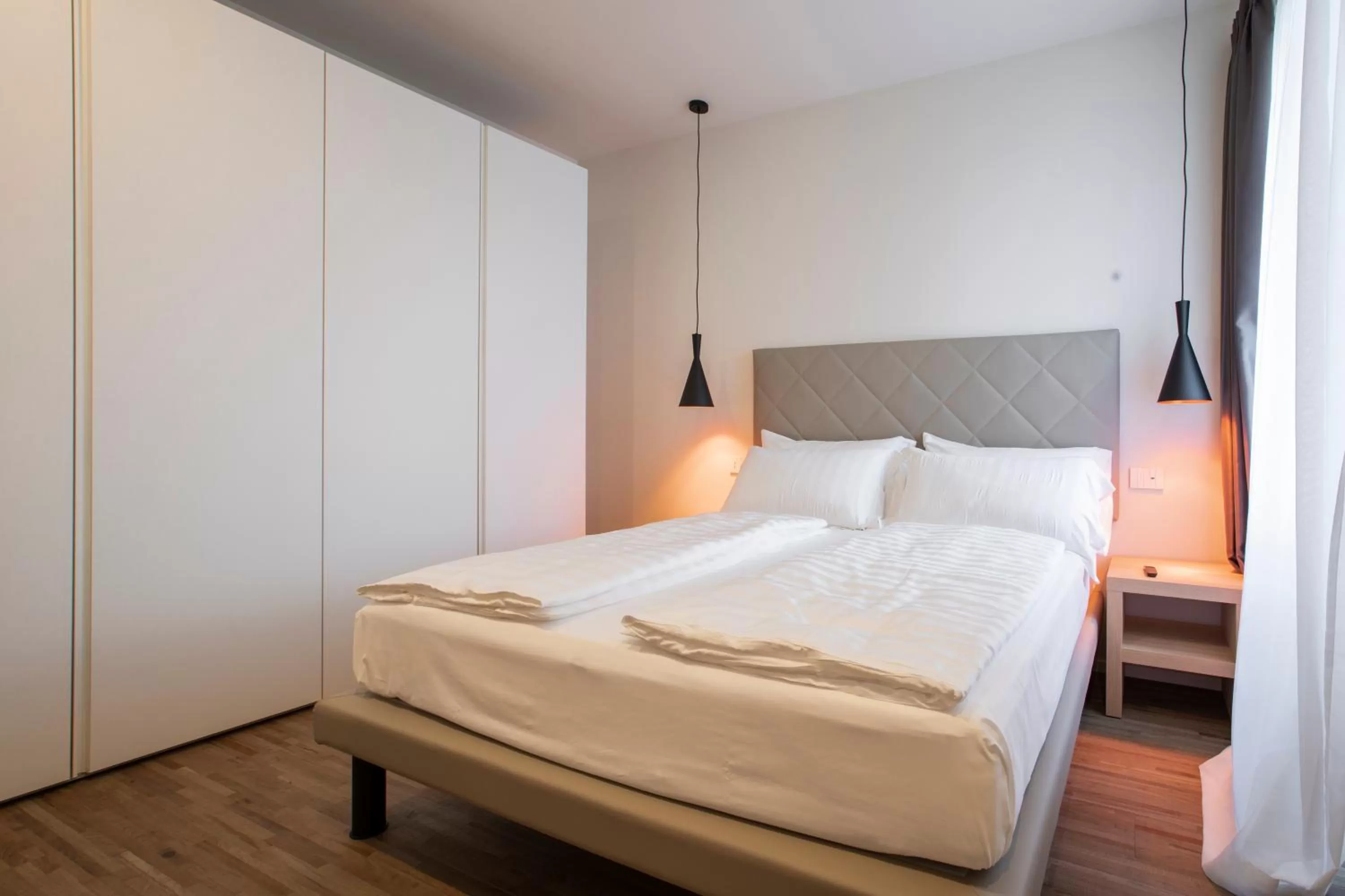 Bed in Ah Villaglori Boutique Apartments