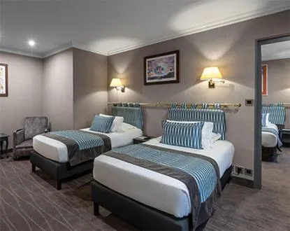 Bed in Le Grand Hotel & Spa