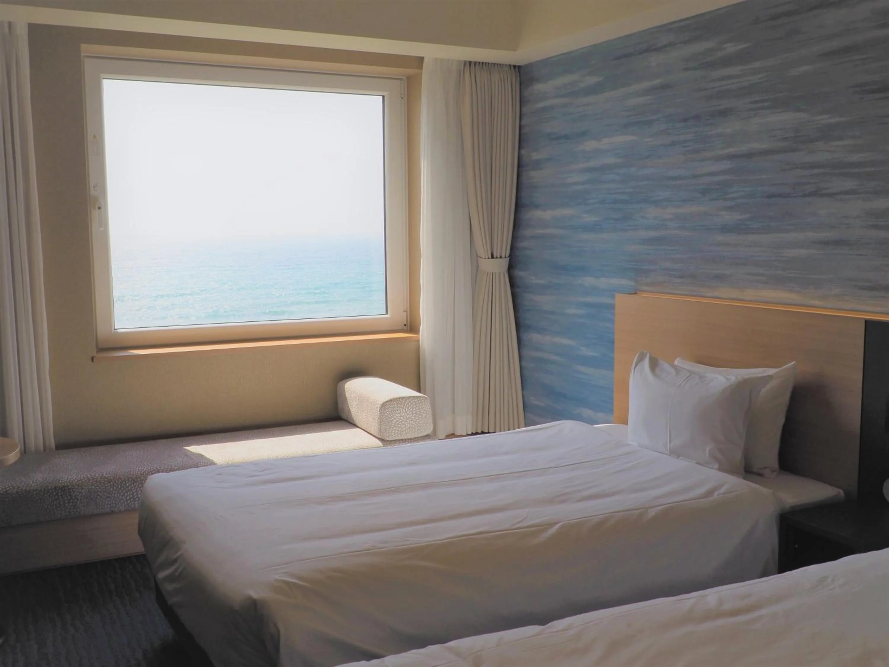 View (from property/room), Bed in Hakodate Yunokawa Onsen Umi to Akari Hewitt Resort