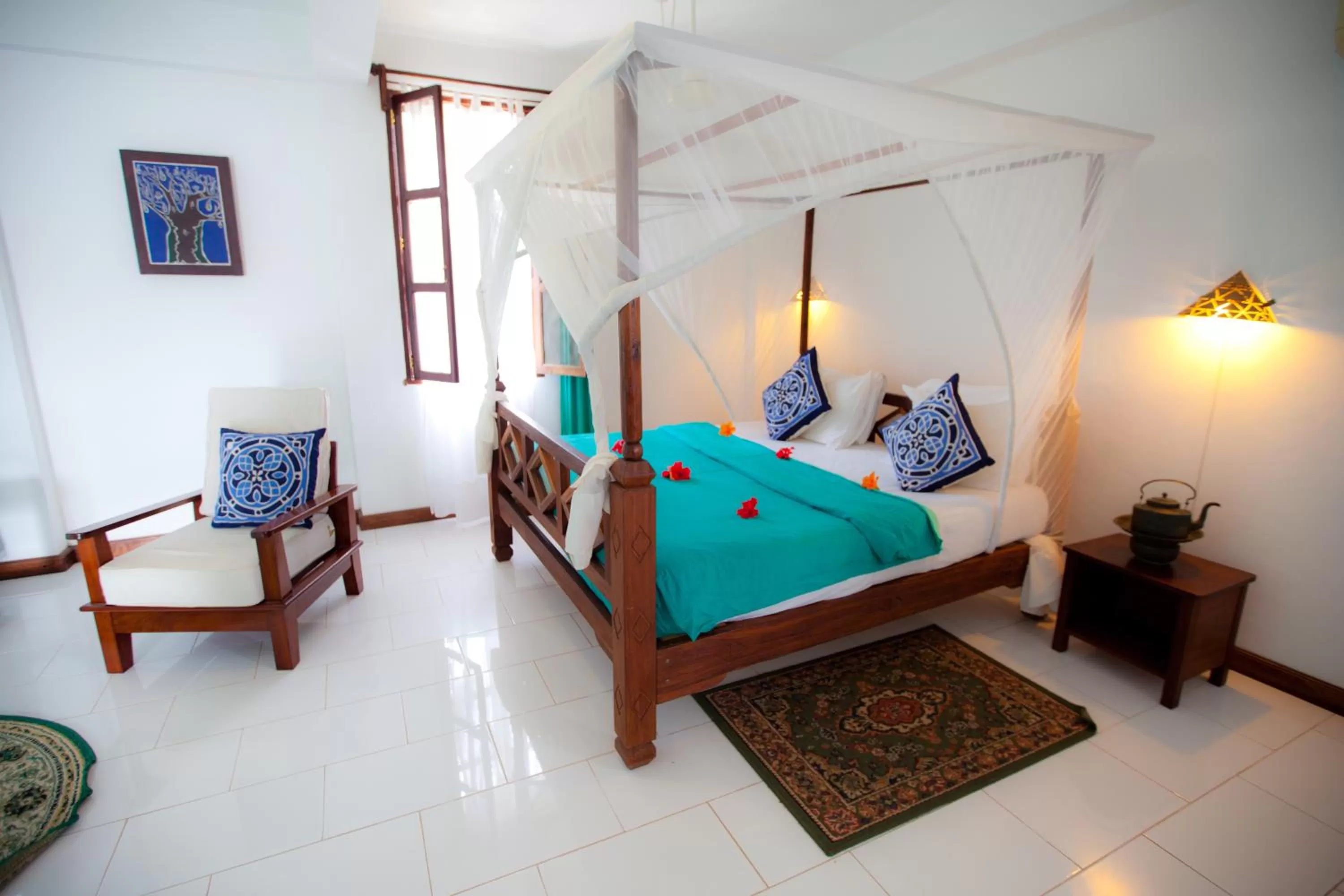 Bed in Flame Tree Cottages