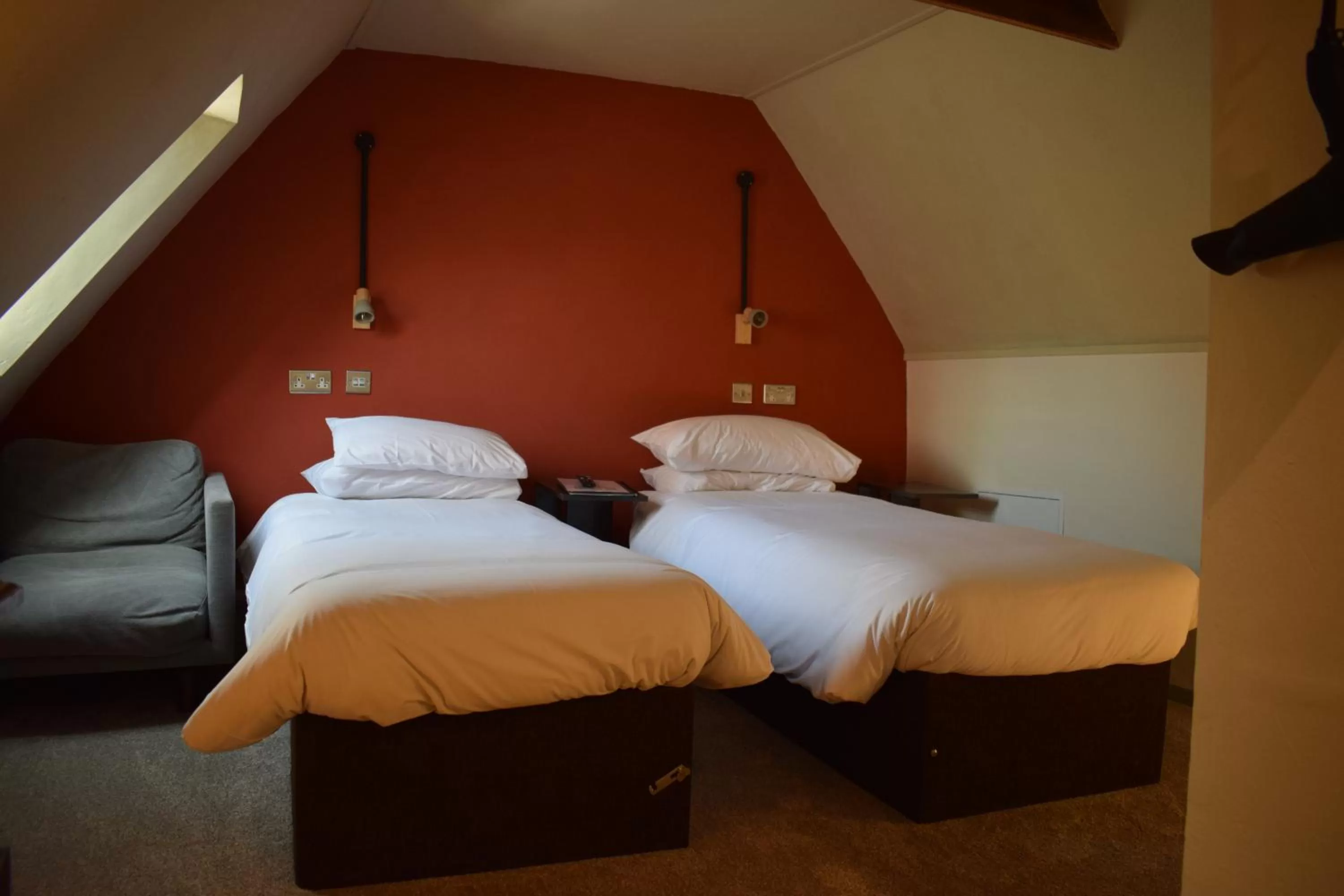 Bed in Alma Inn & Dining Rooms