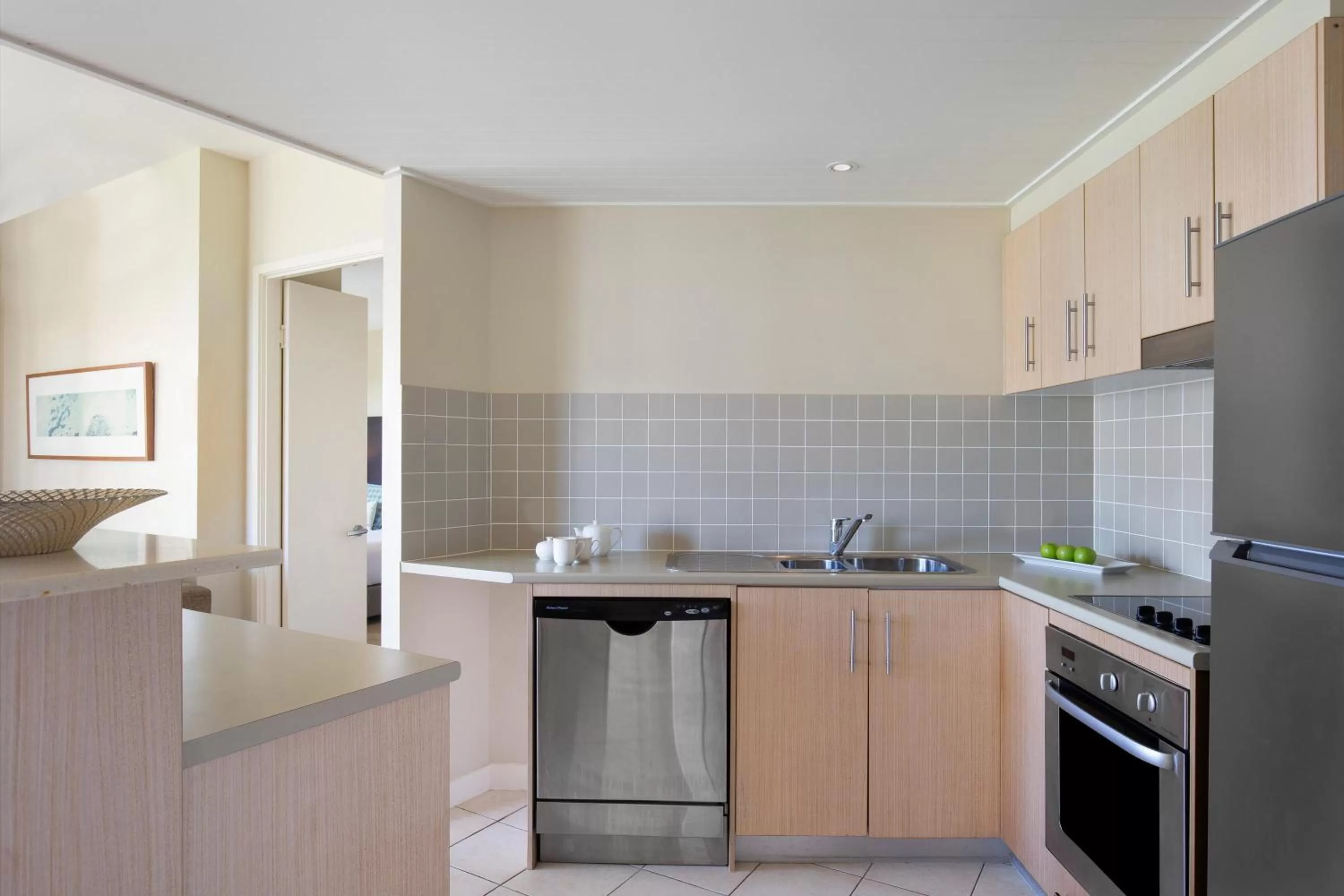 Kitchen or kitchenette in Mantra on Salt Beach