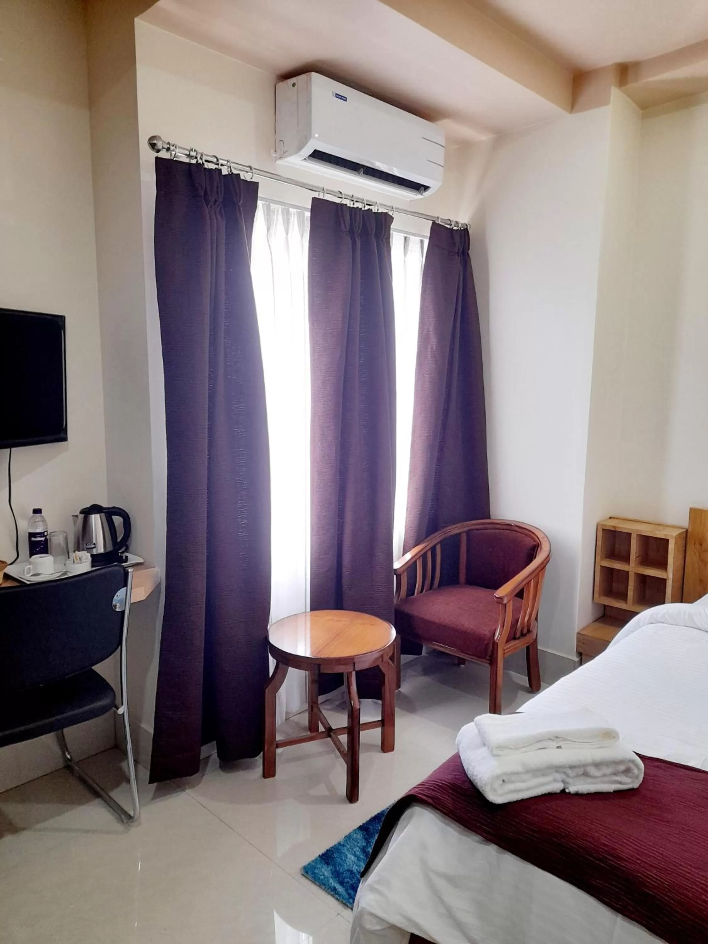 Bed in Bharalu Residency