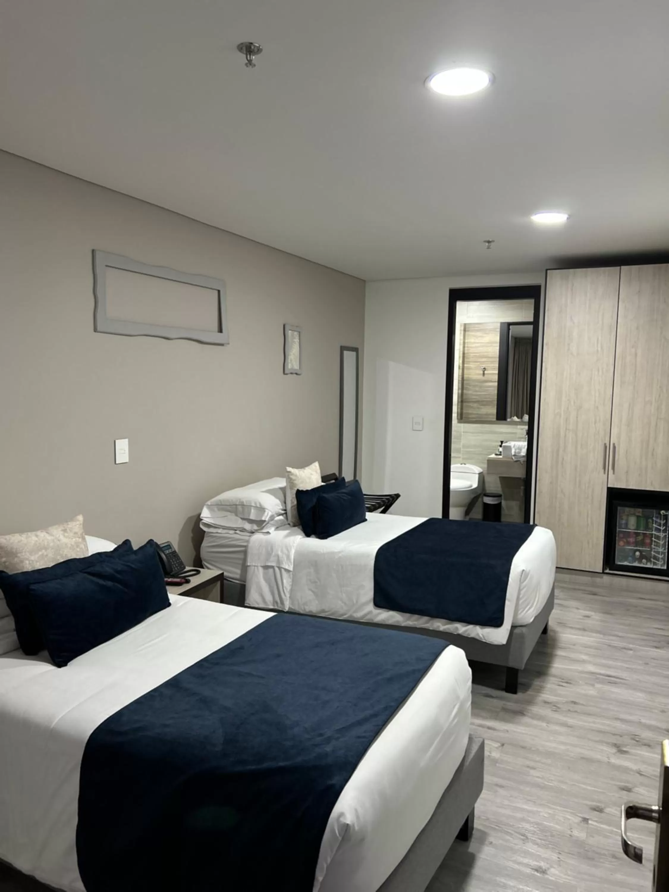 Bed in Hotel WLH Silver Bogota - White Lighthouse