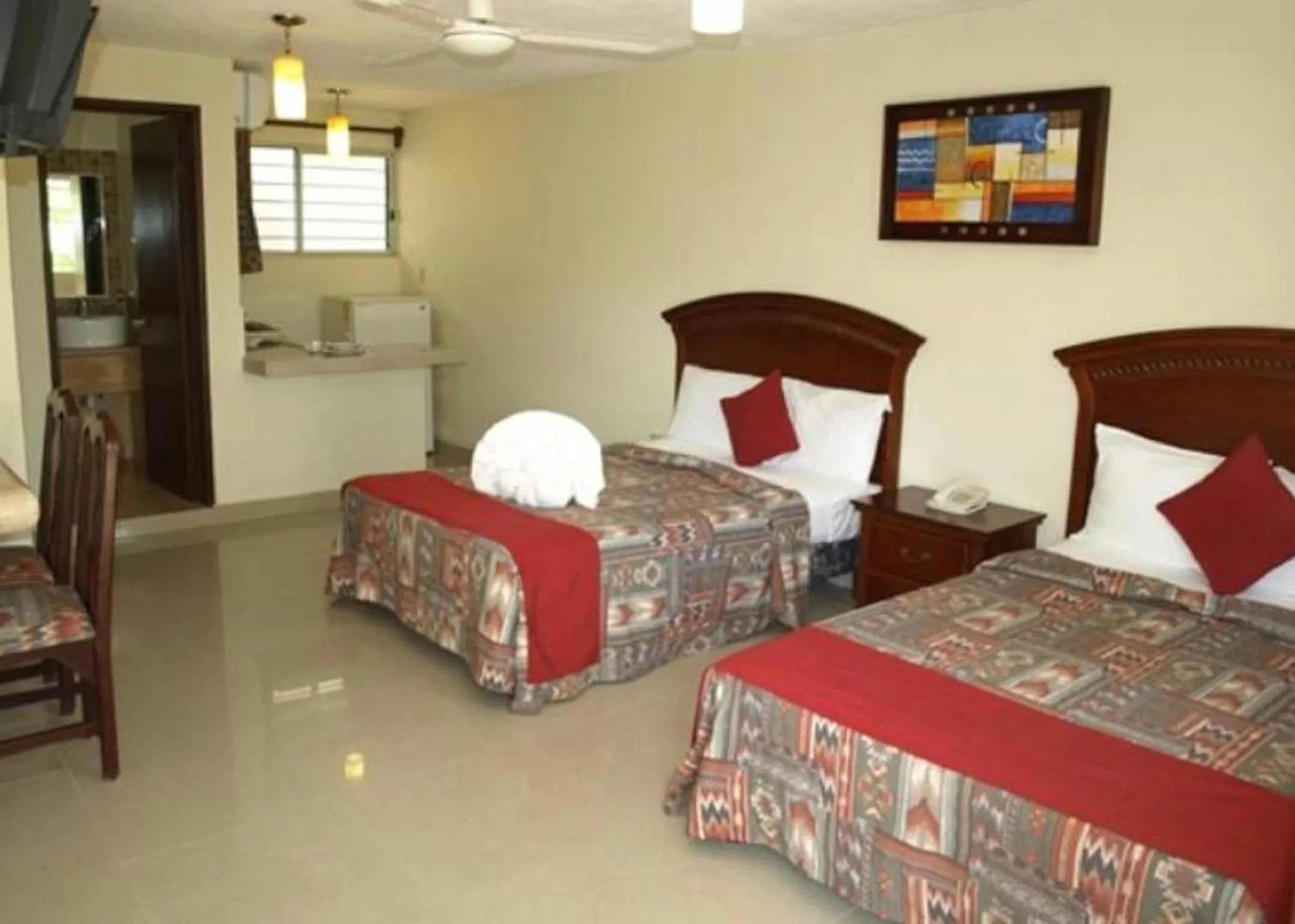 Photo of the whole room, Bed in Hotel El Campanario Playa del Carmen