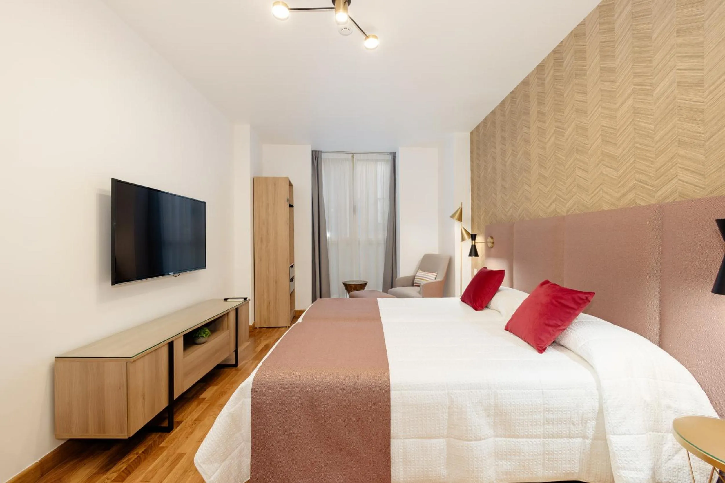 Bed in Apartamentos Debambú