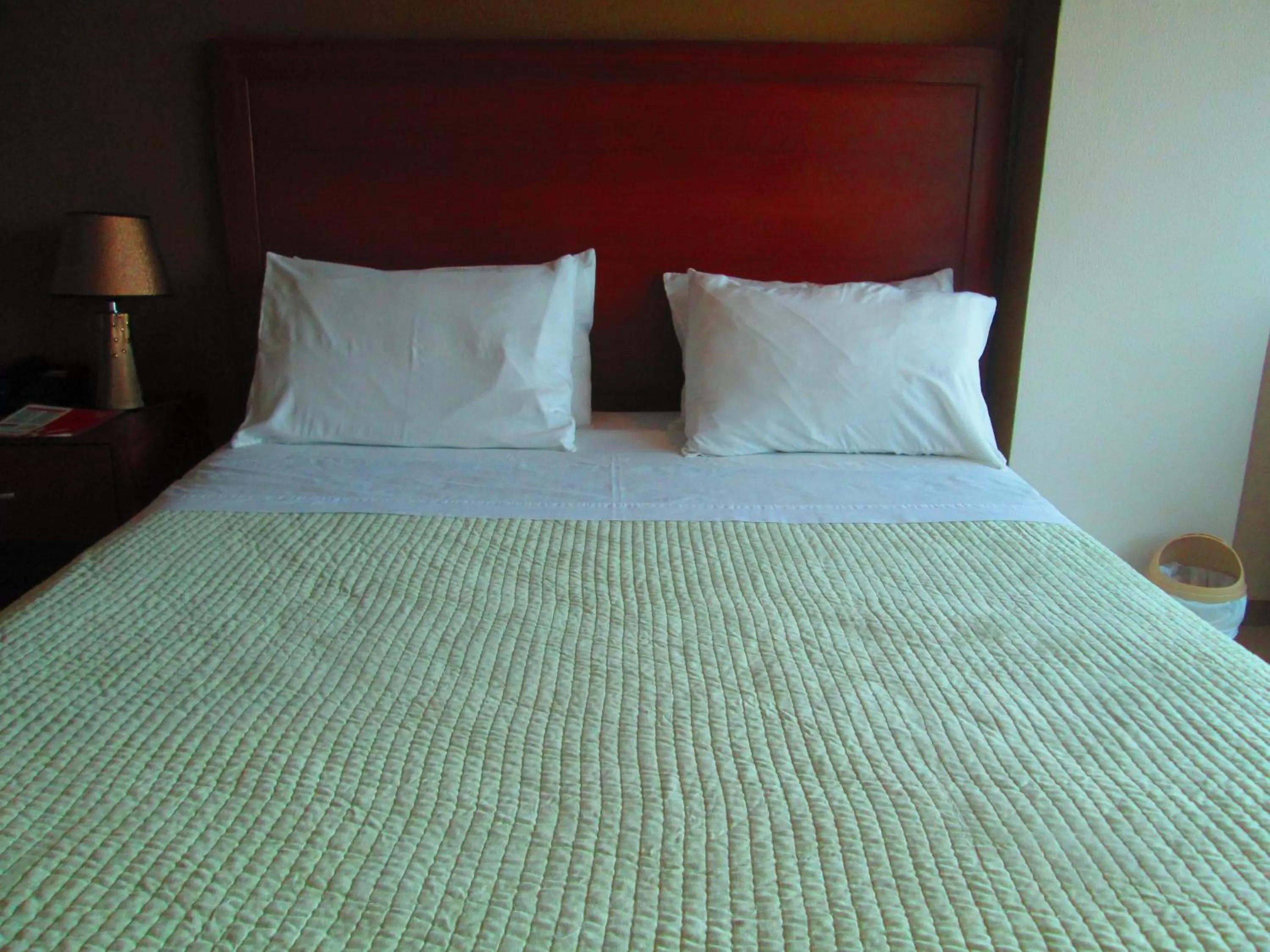 Bed in Hotel Garzota Inn