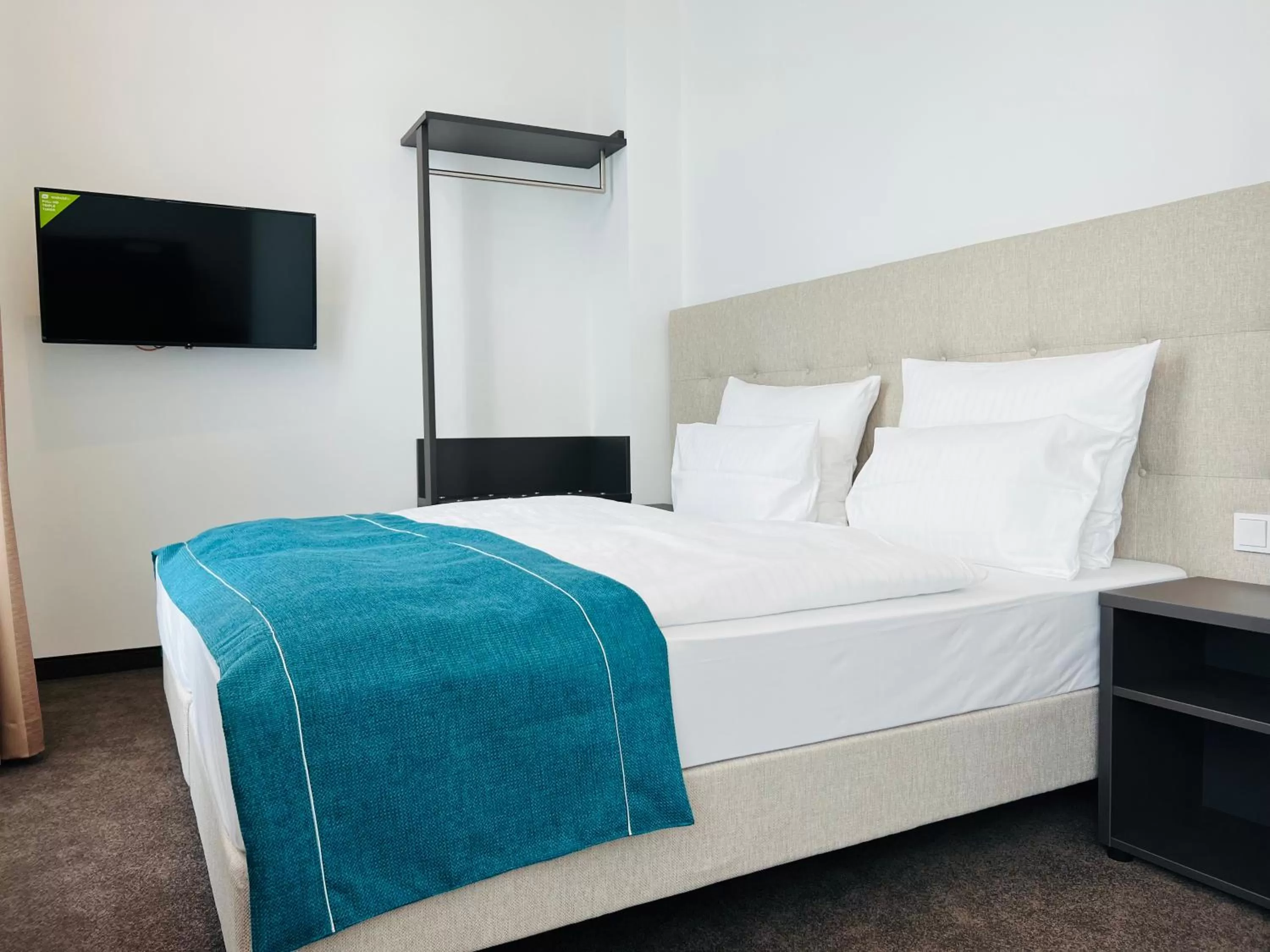 Bed in The Monument Hotel - BW Signature Collection