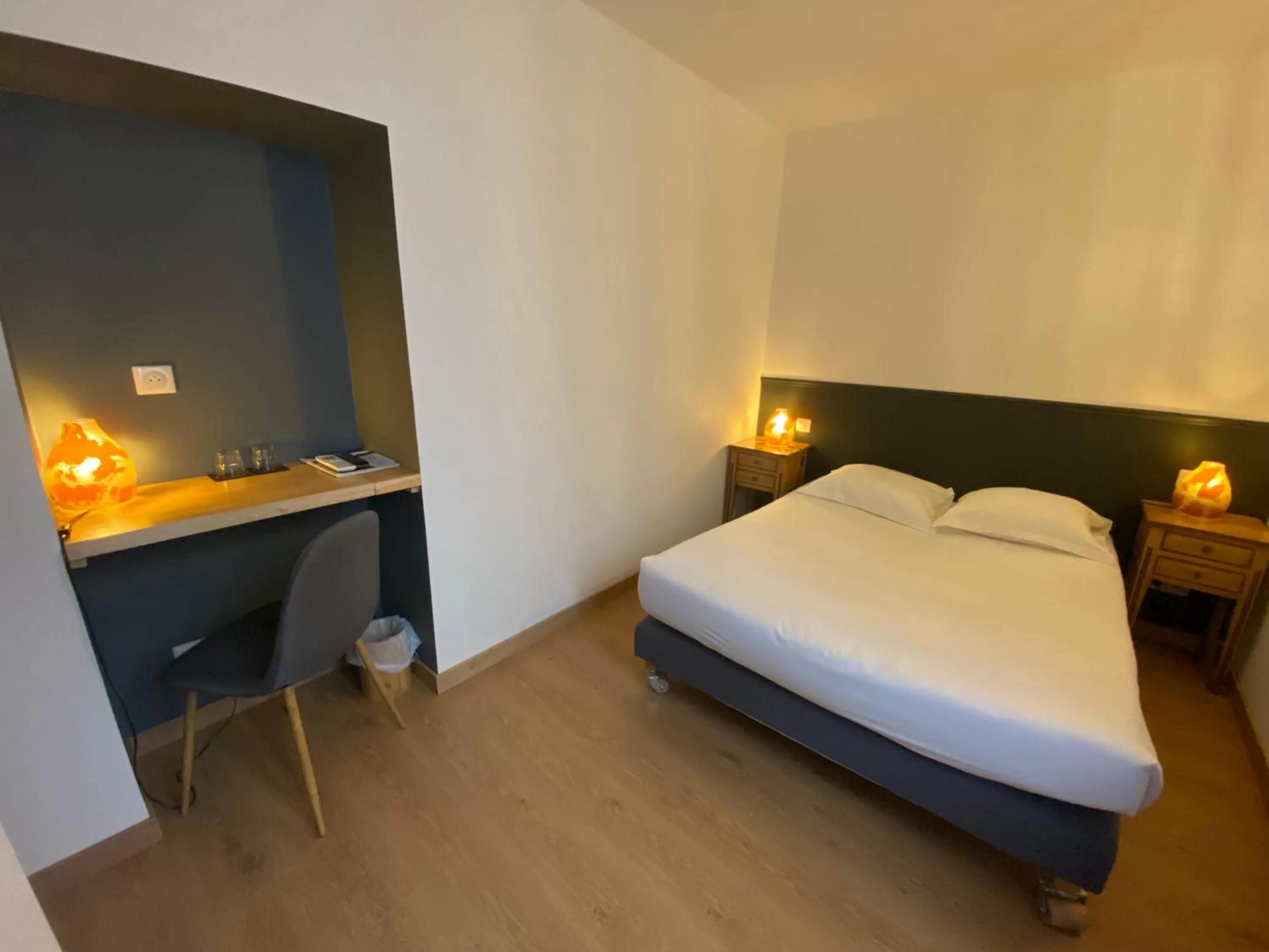 Bedroom in Le Miredames Hôtel-Bar