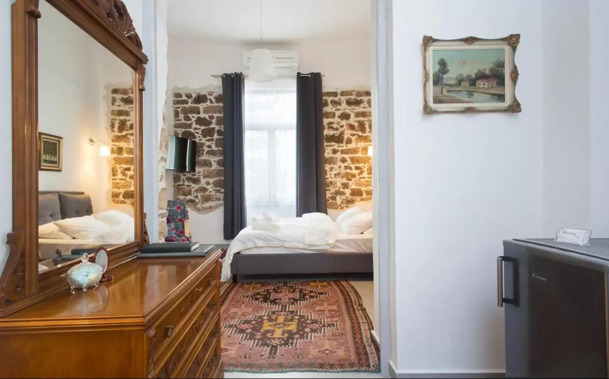 Bed in A litte Taste of Home Guest House