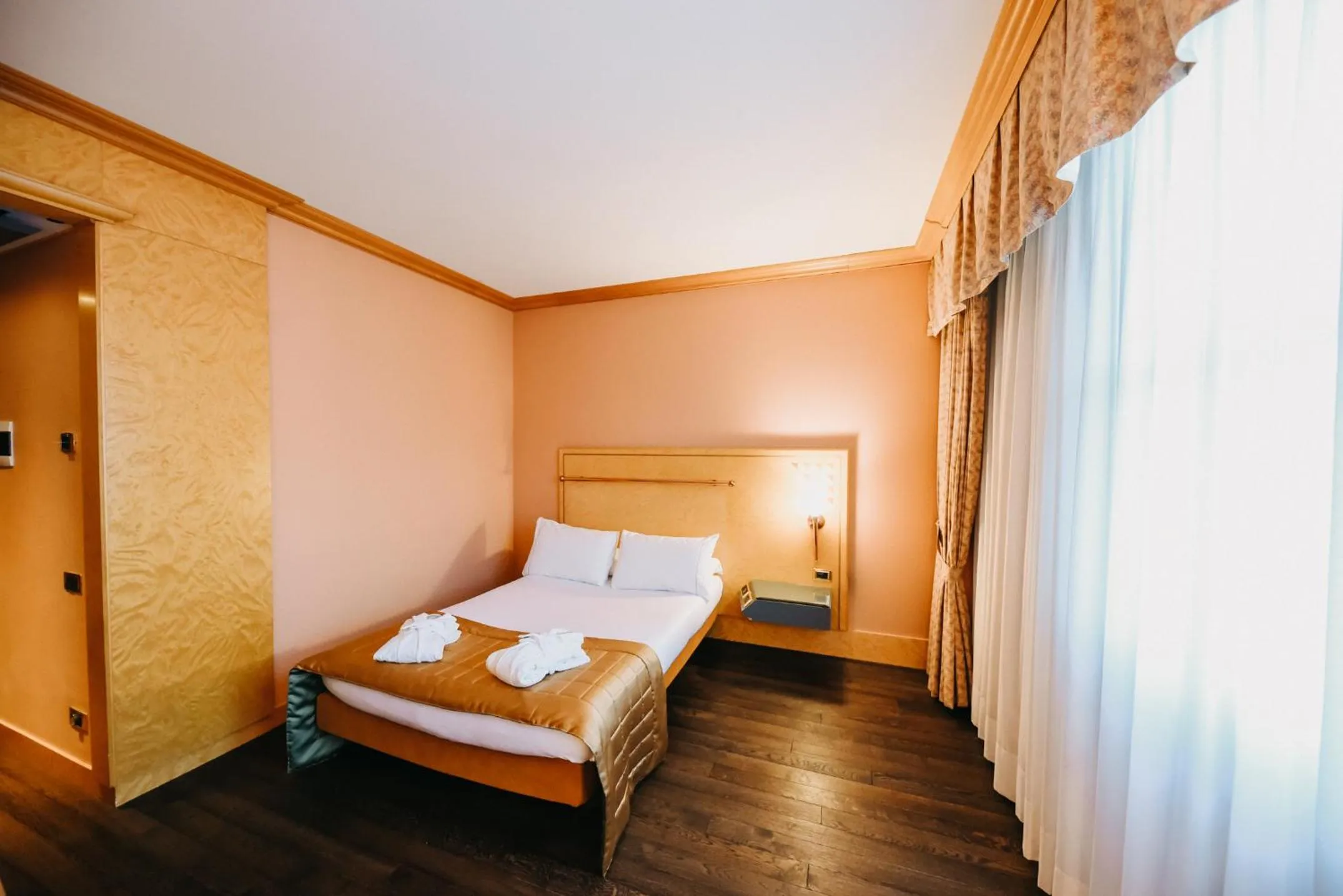 Bed in SHG Hotel Antonella