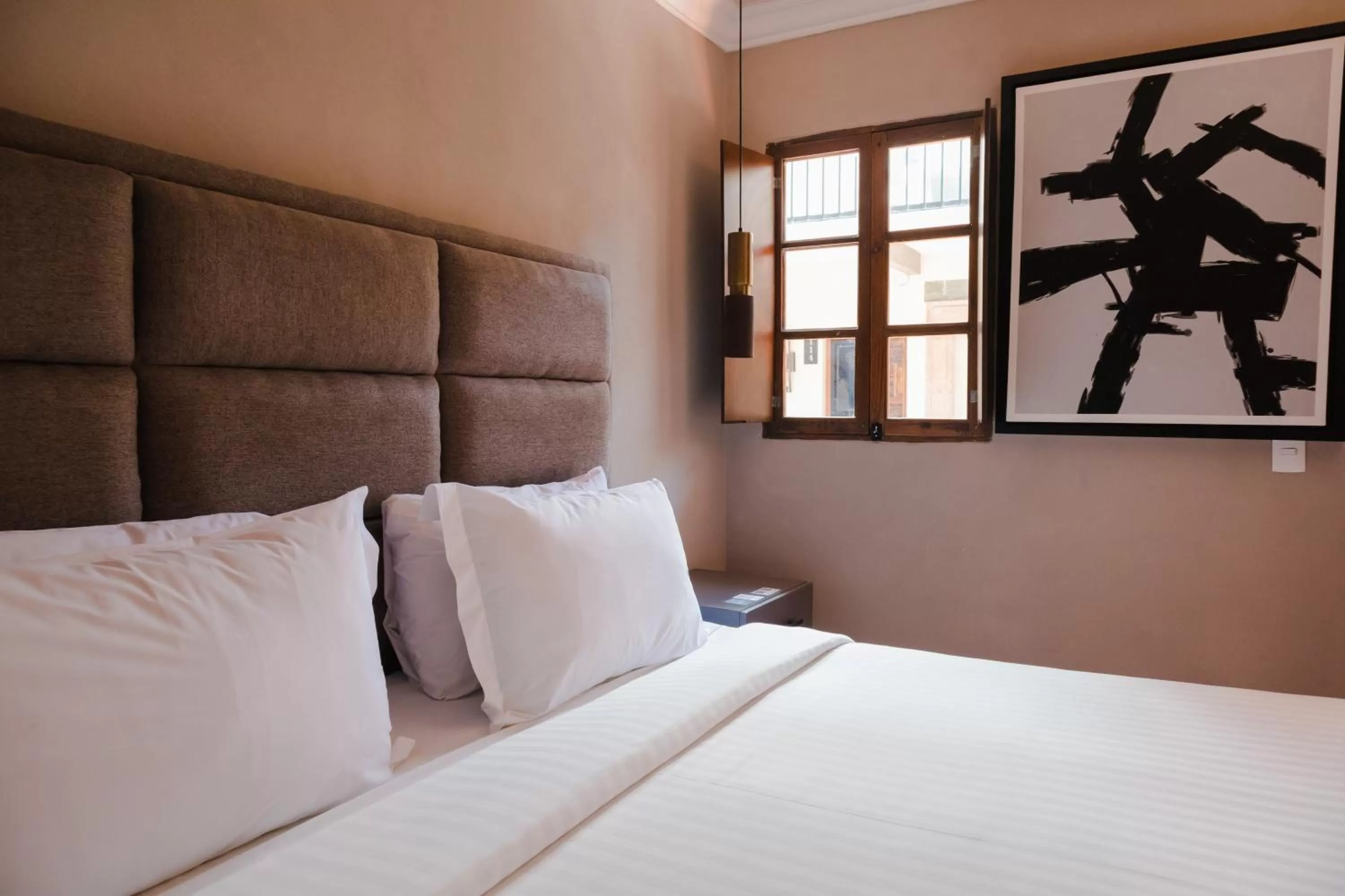 Bed in Mikaella Hotel