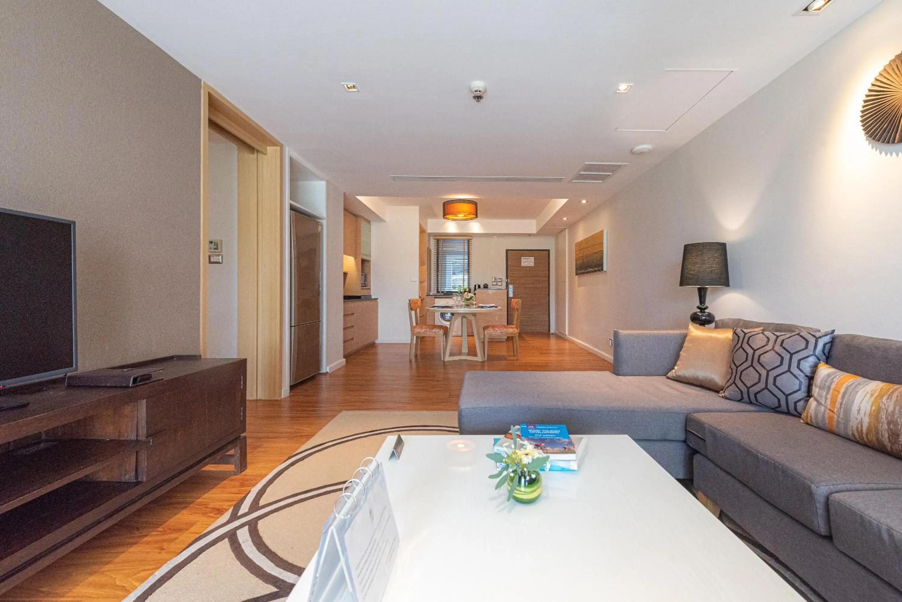 Living room in Summit Windmill Golf Suite Hotel at Suvarnabhumi