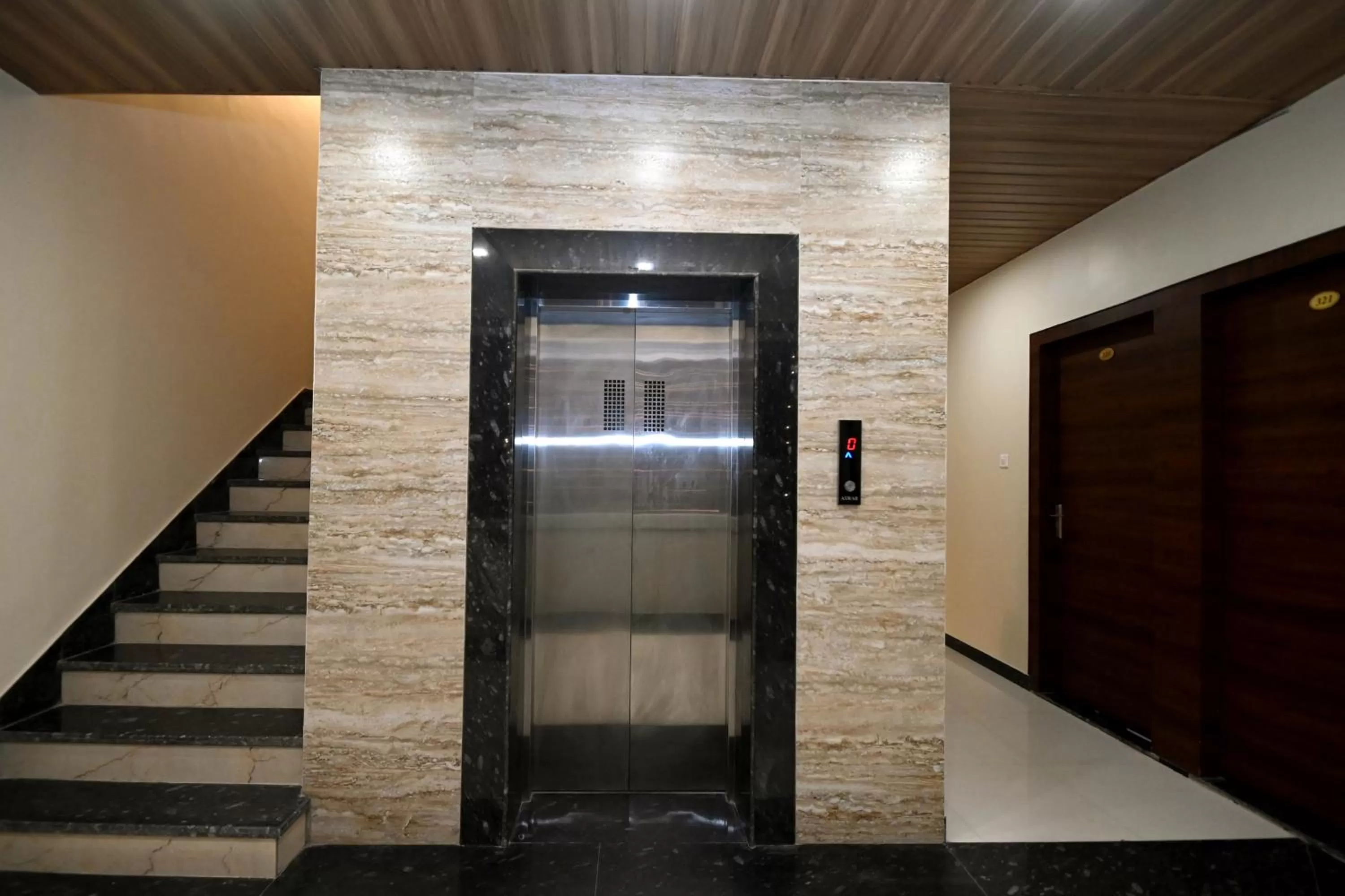 elevator in Hotel Hallmark By THC Group