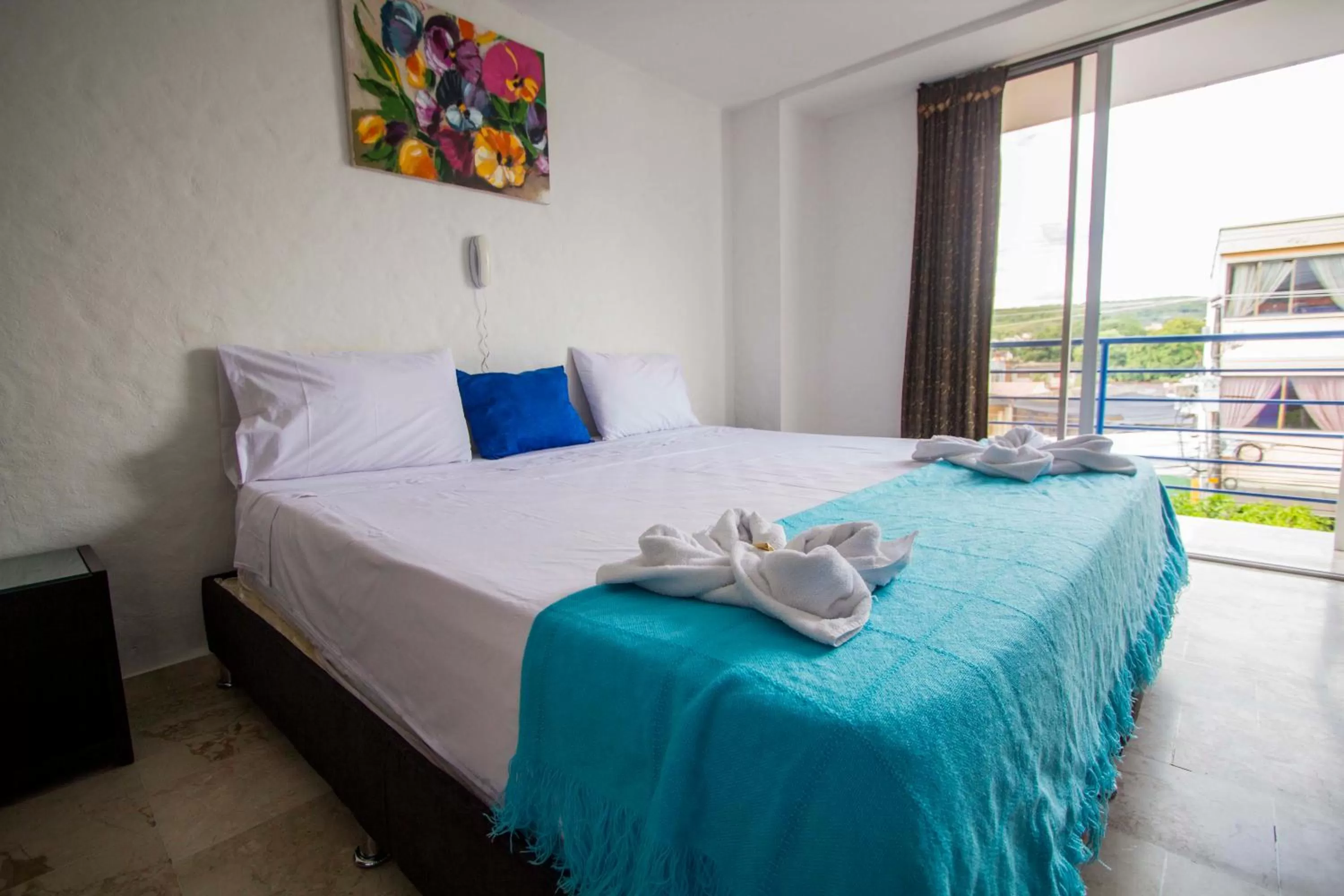 Bed in Blue Star Hotel