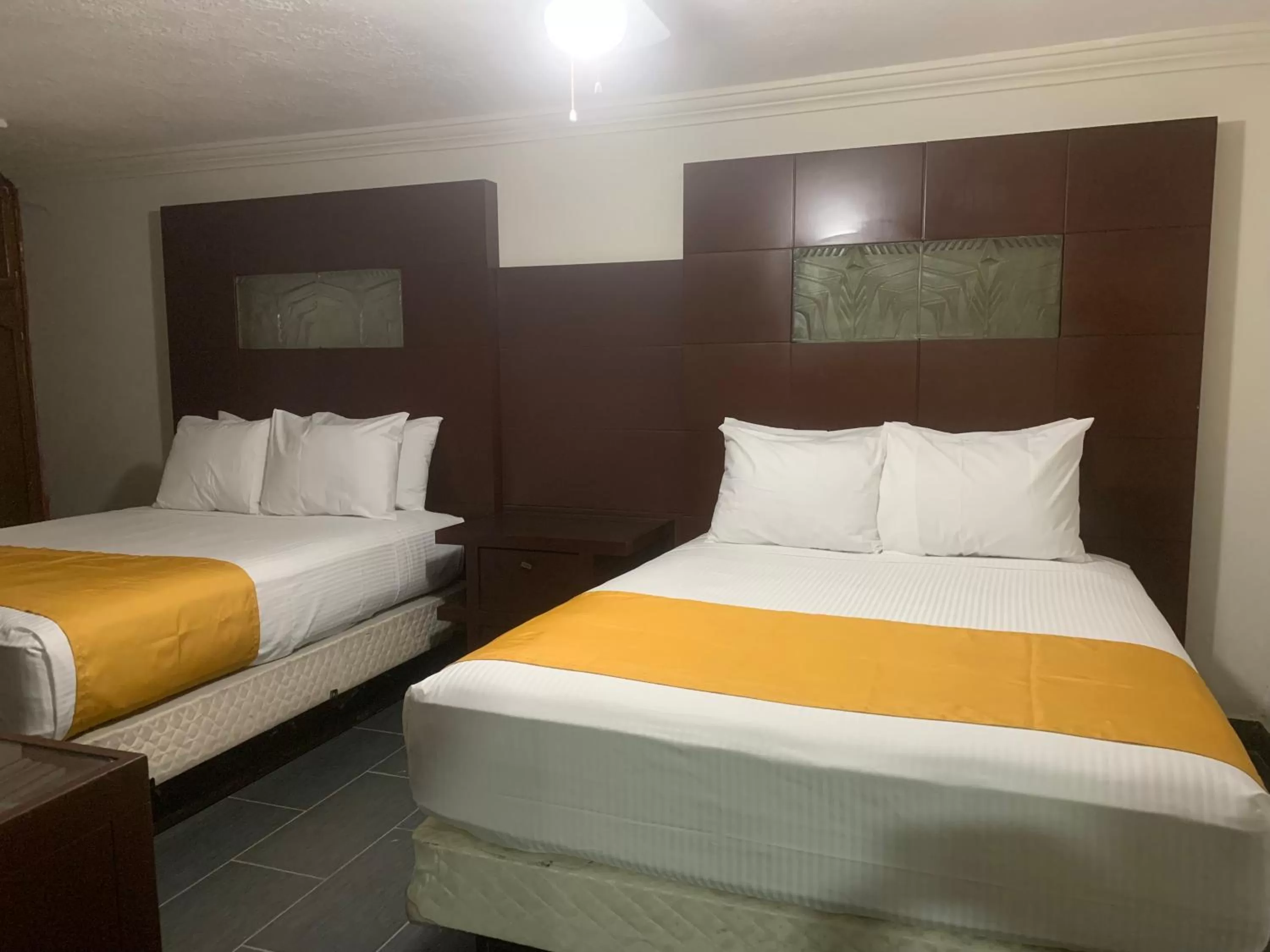 Bed in HOTEL DORADO DIAMANTE