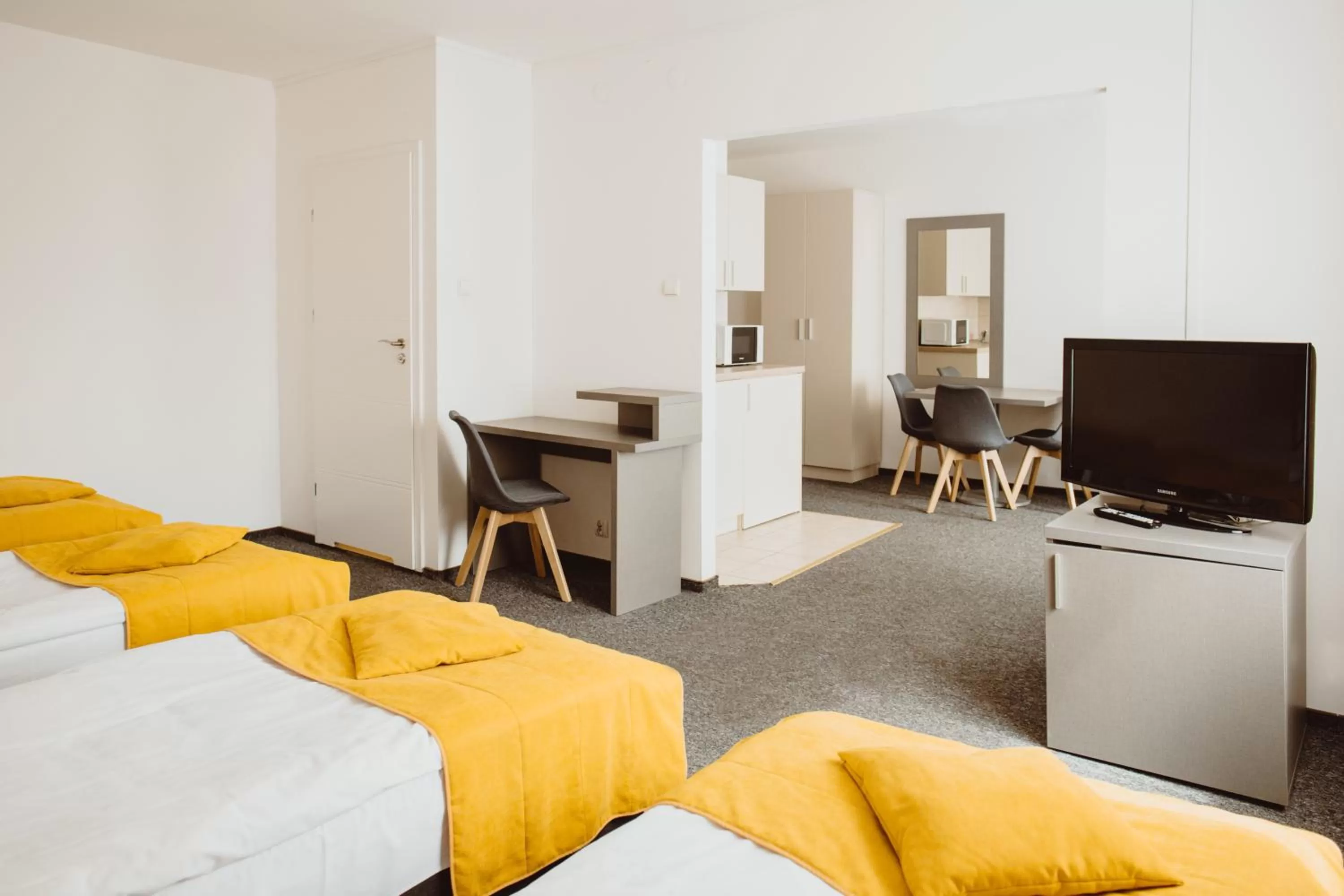 Communal lounge/ TV room, Bed in Arche Hotel Siedlce