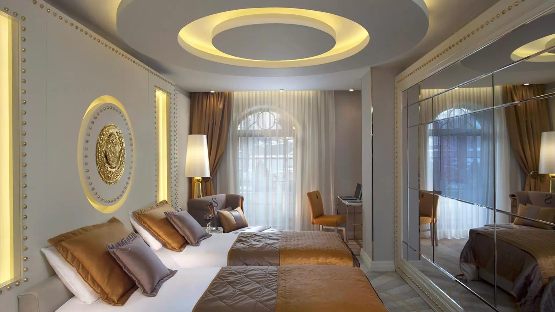 Bed in Sura Design Hotel & Suites