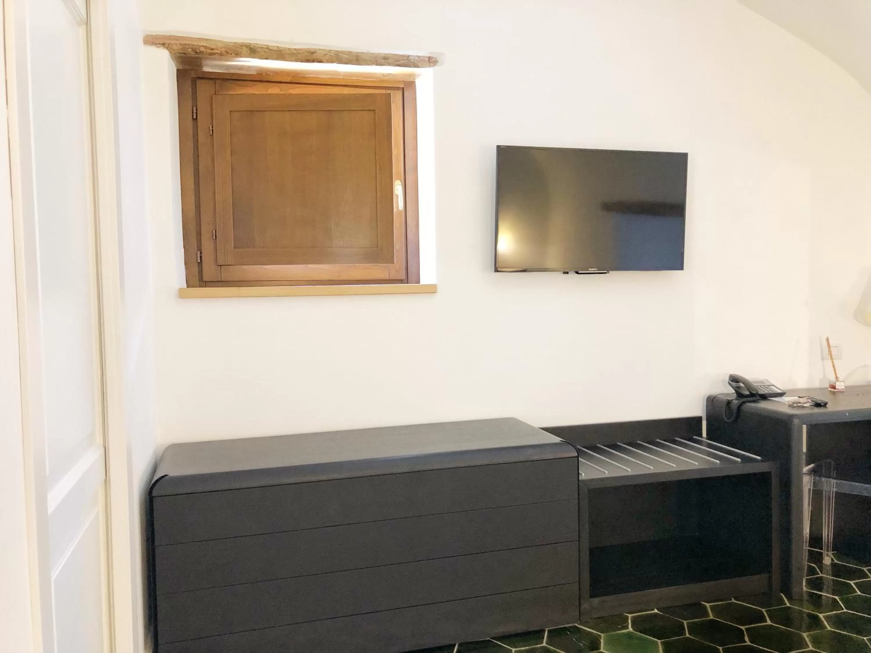 TV and multimedia in Tenuta Duca Marigliano Boutique Hotel