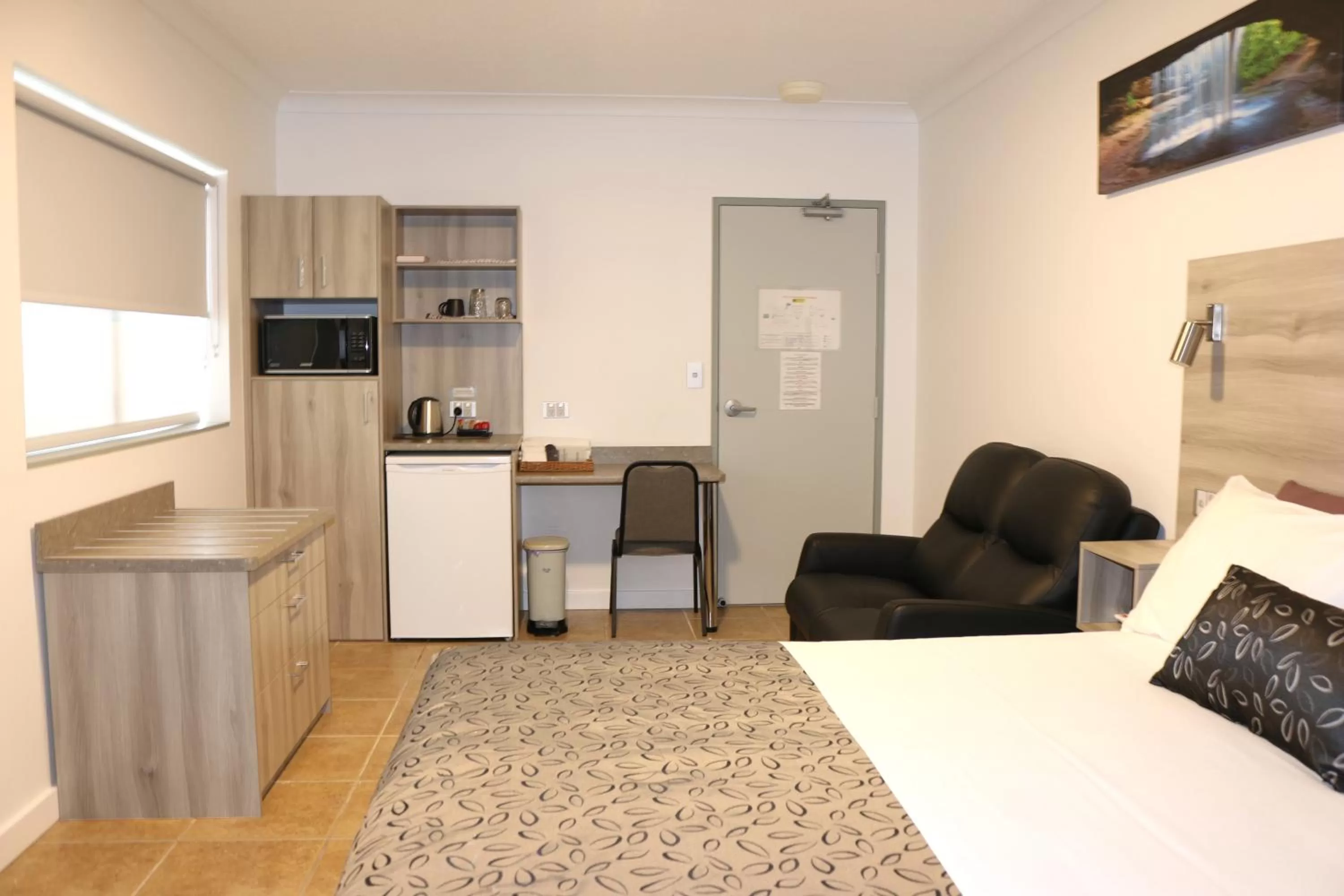 Bed in Childers Oasis Motel