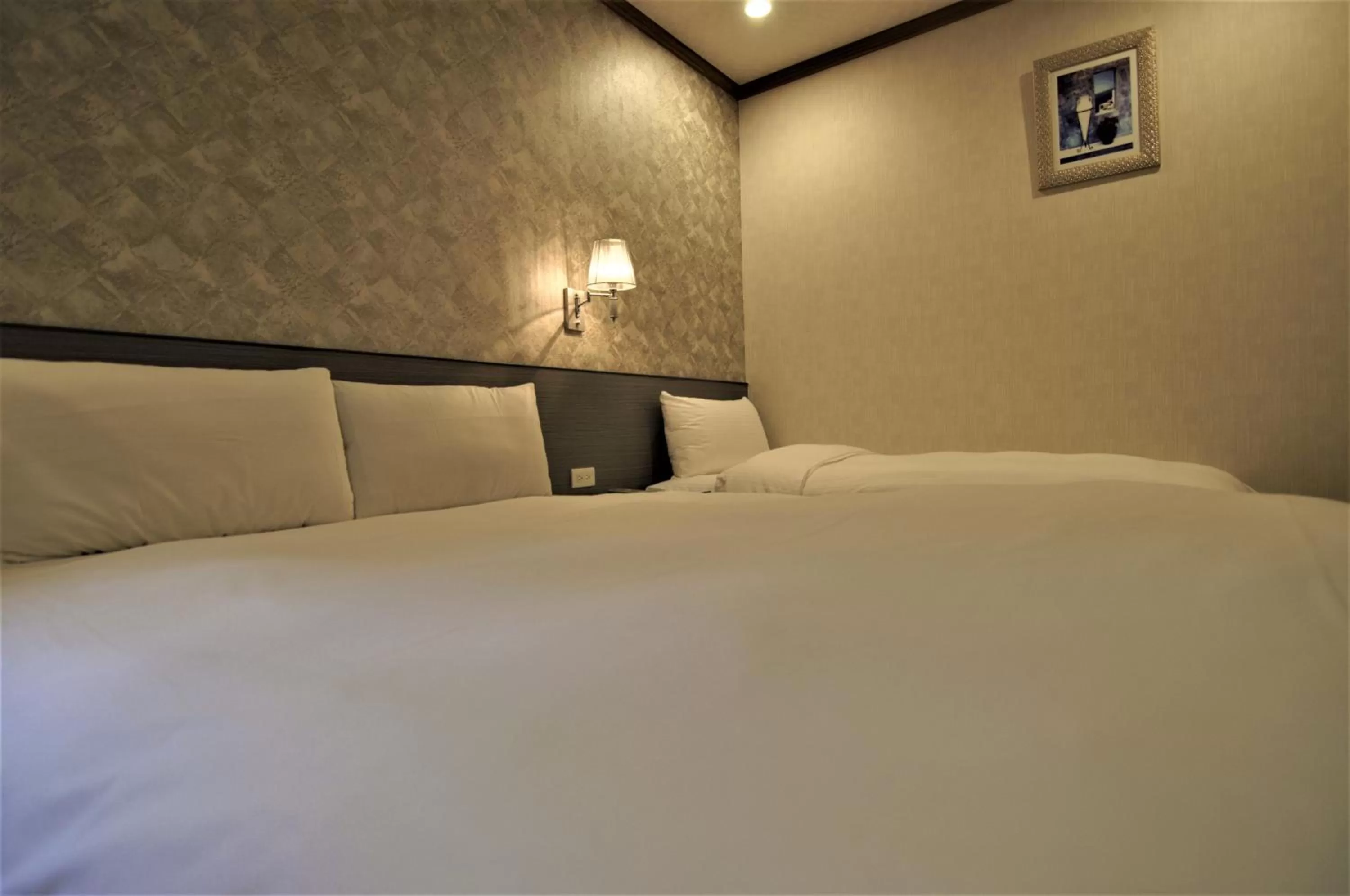 Bedroom in 泊居旅店 Oursinn Hotel