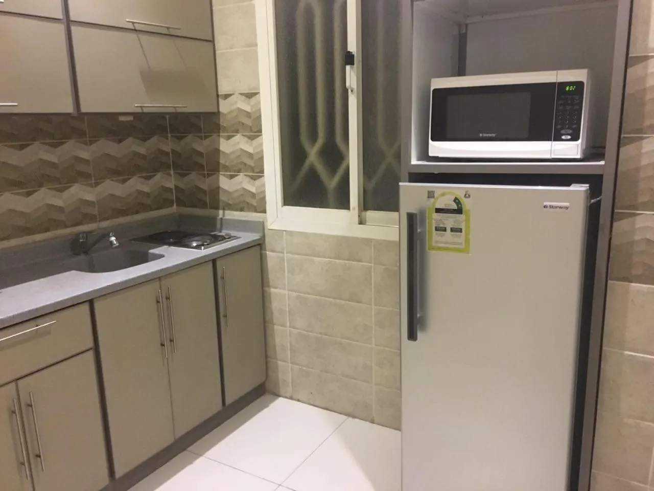 Taleen Al Nakheel Apartment