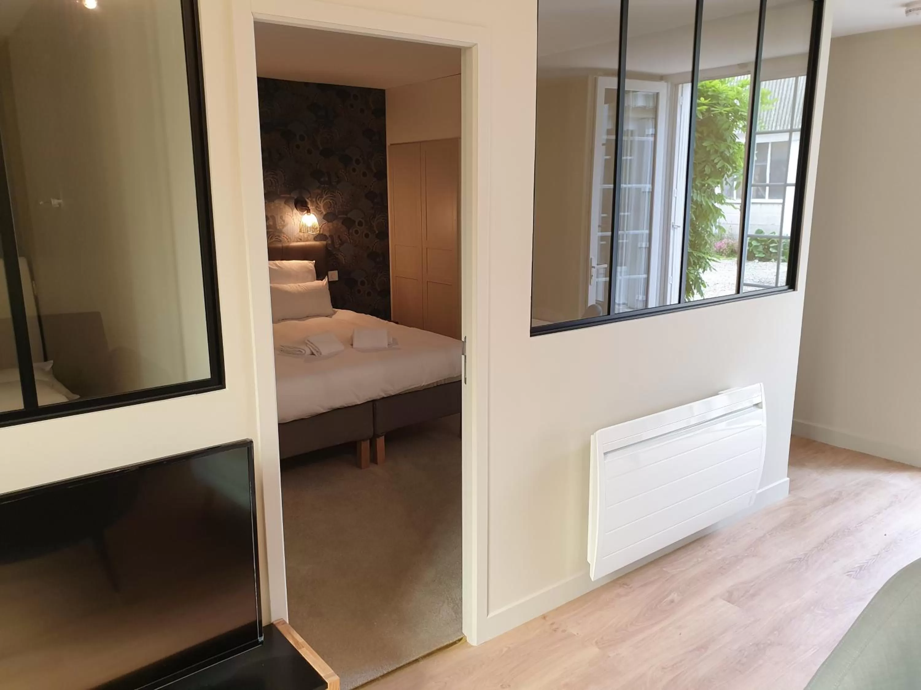 Bed in Au Loup Historic Apartments