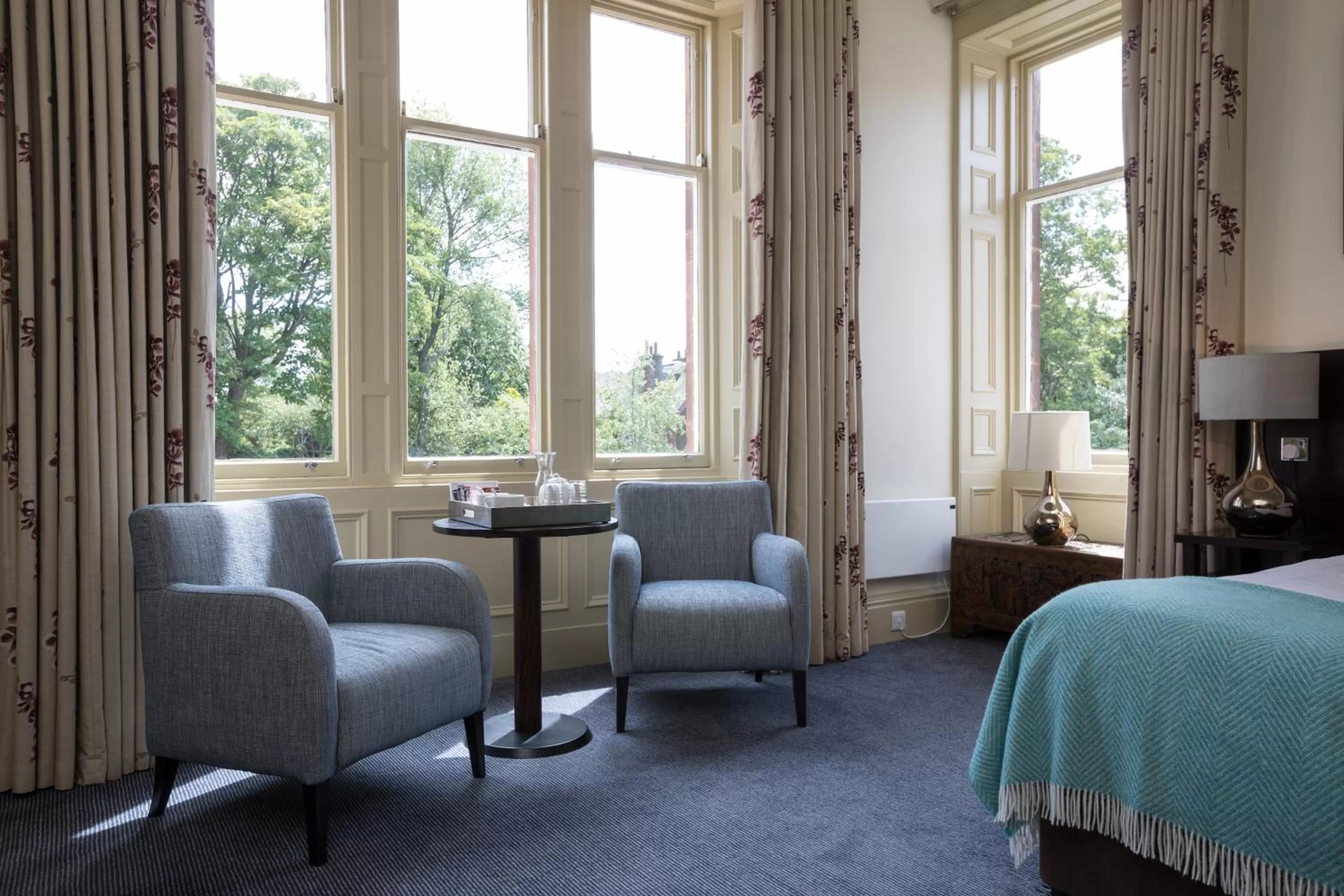 Seating area, Bed in Nether Abbey Hotel