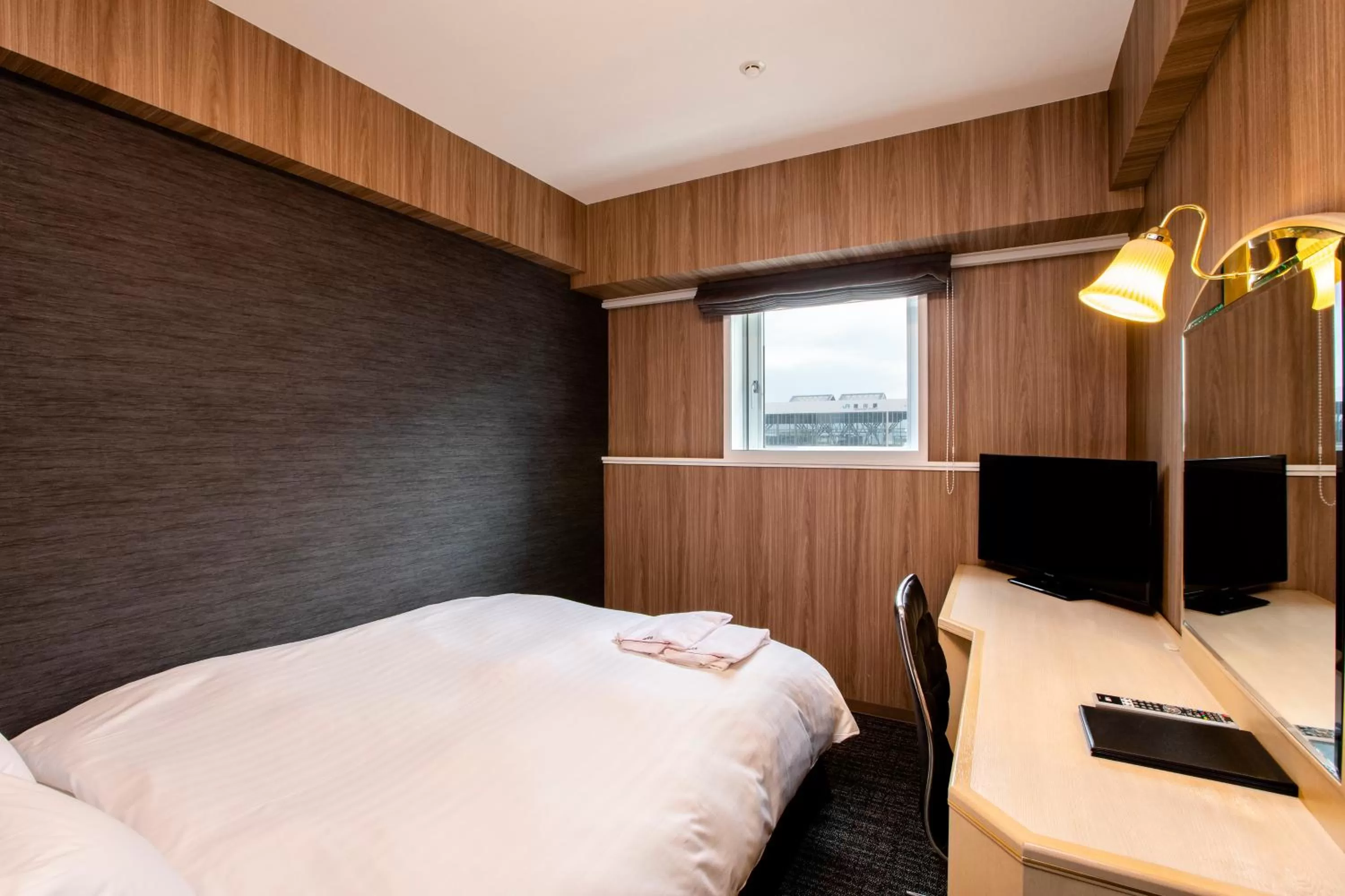 Photo of the whole room, Bed in Hotel Wing International Asahikawa Ekimae