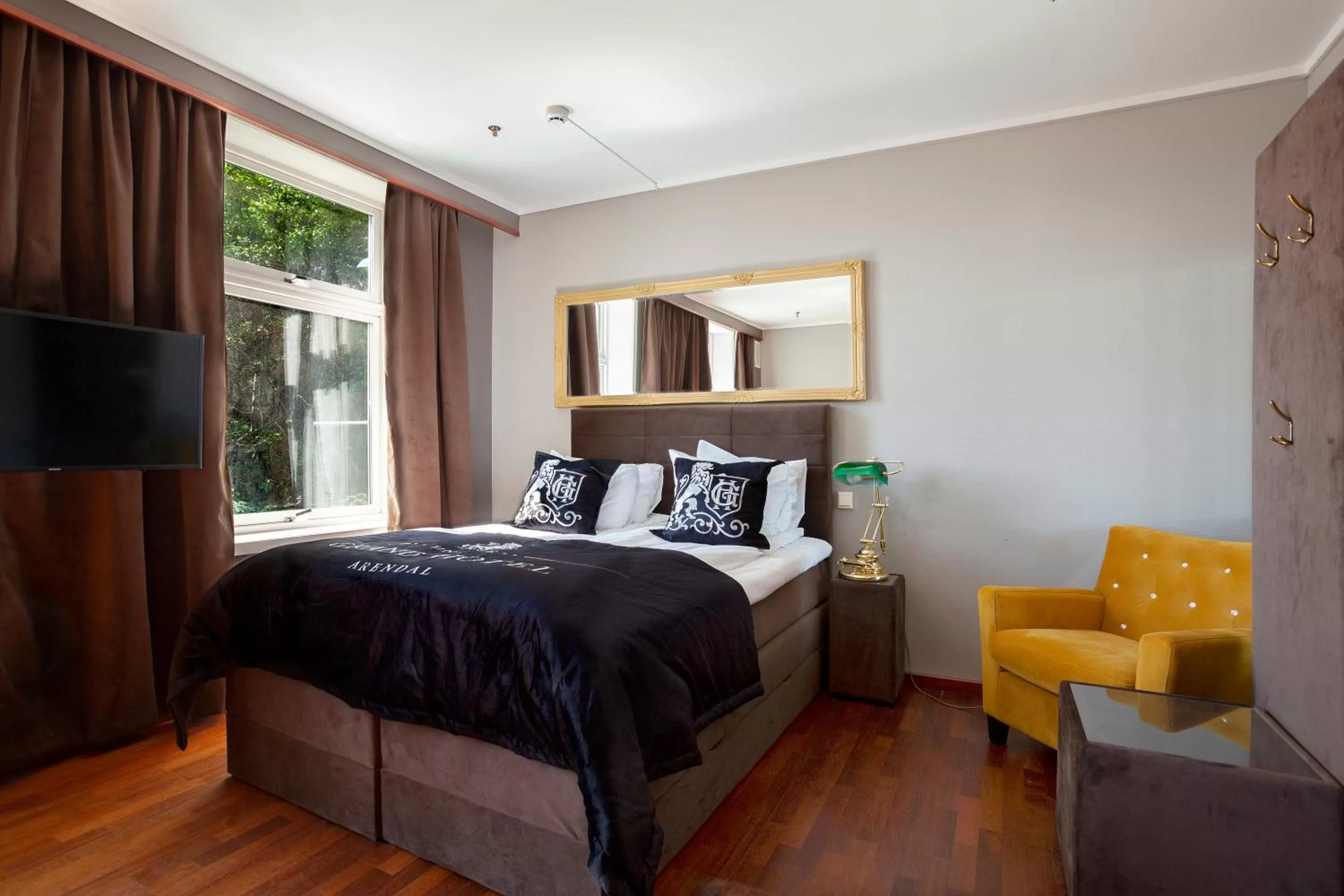 Bed in Grand Hotel Arendal - Unike Hoteller