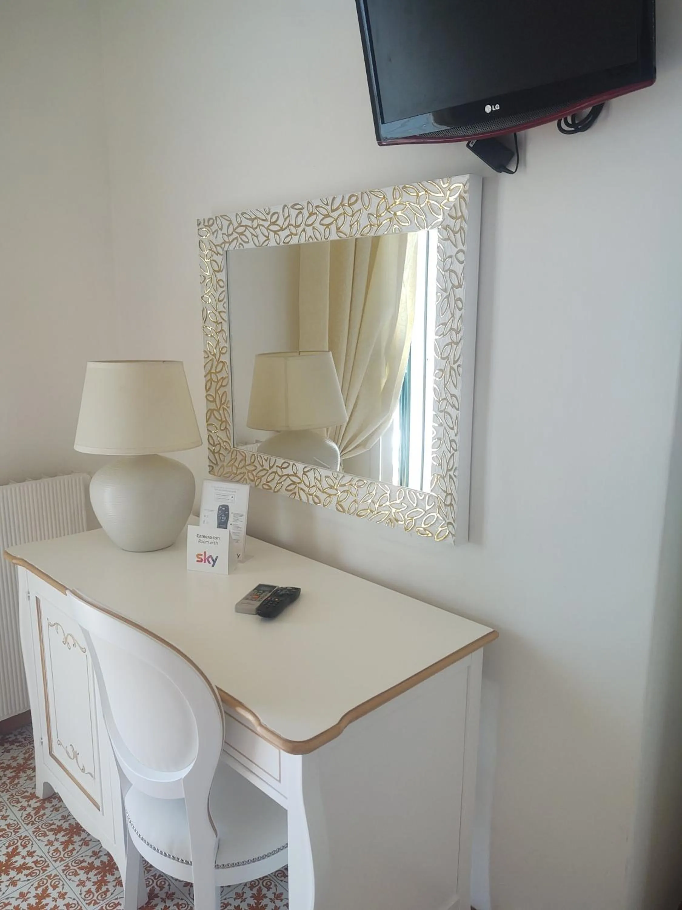 Bedroom in Hotel La Perla