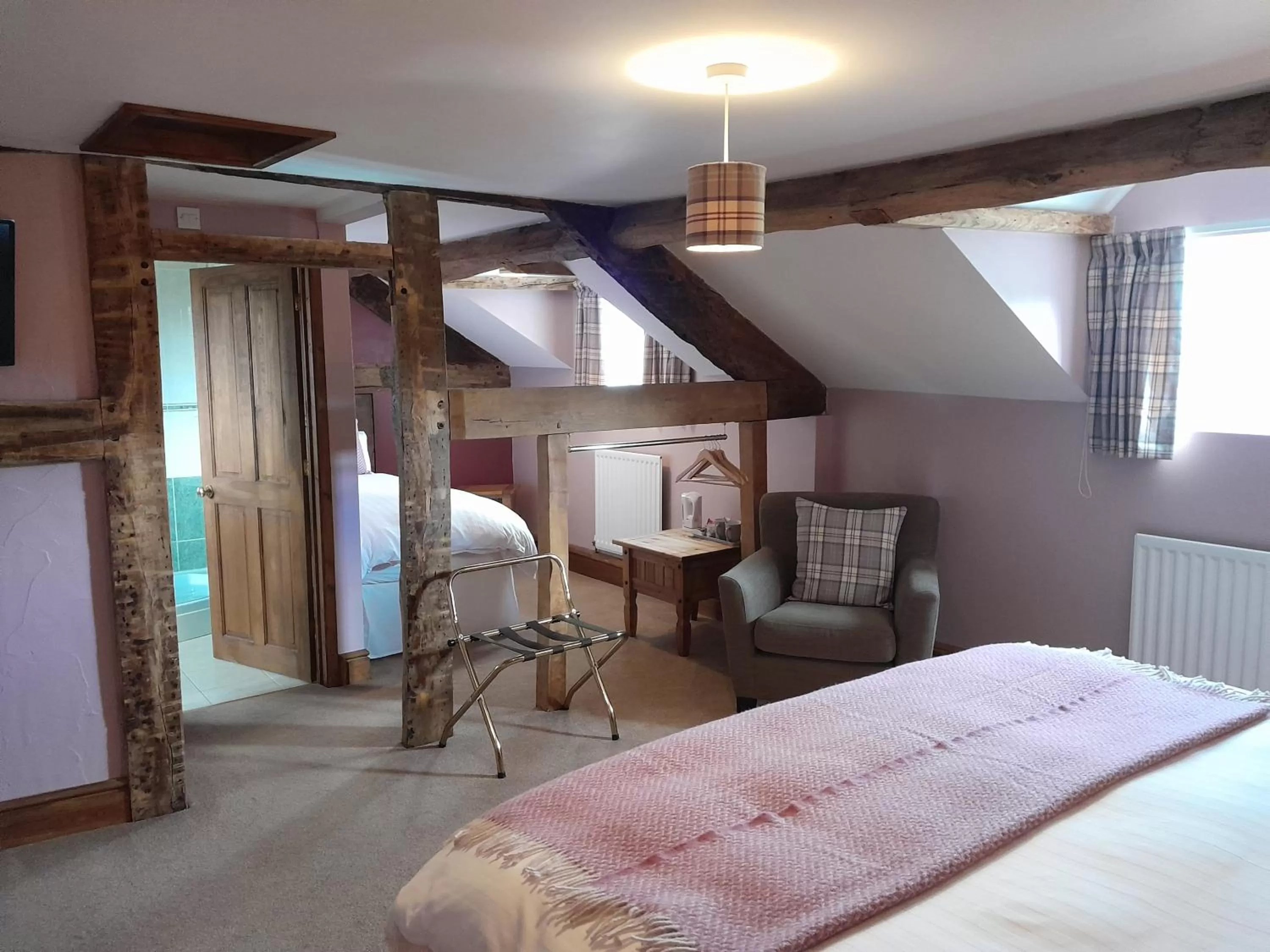 Bed in The Dolfor Inn