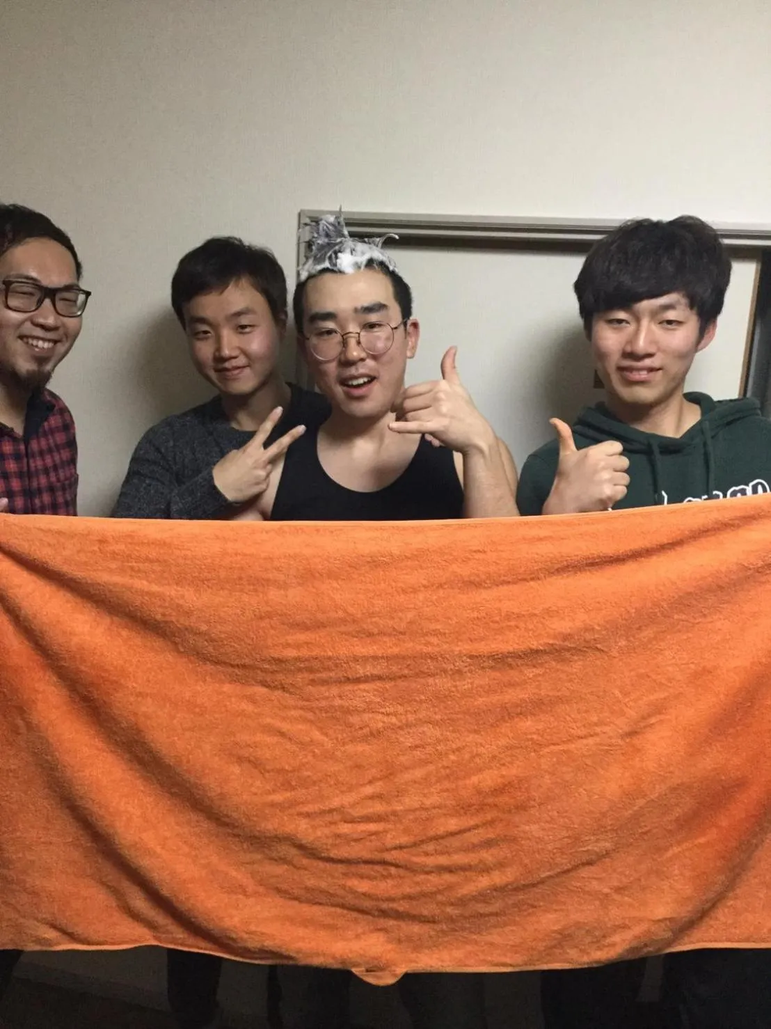 Communal lounge/ TV room in Guest House Sakurakomachi