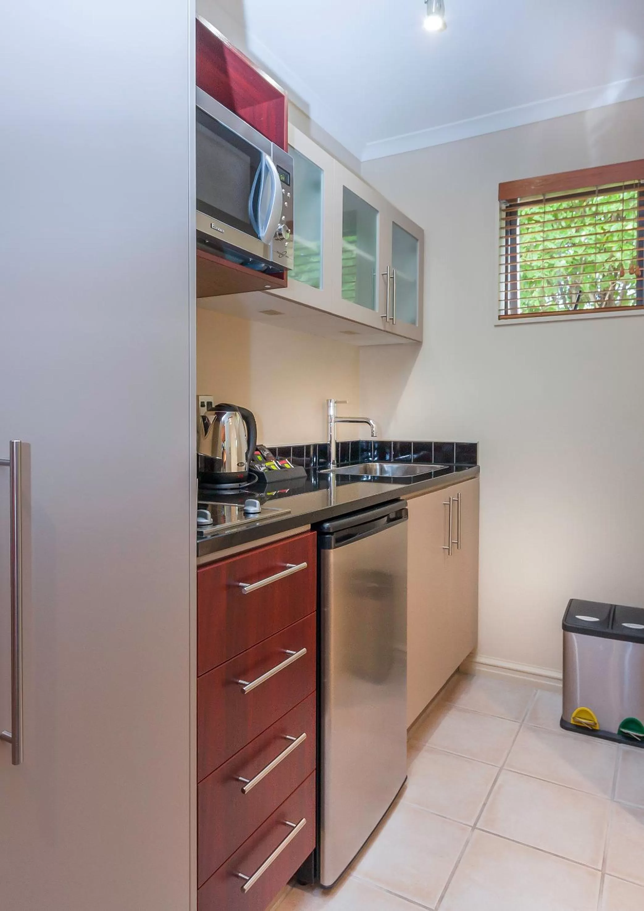 Kitchen or kitchenette in Kauri Motel on Riccarton