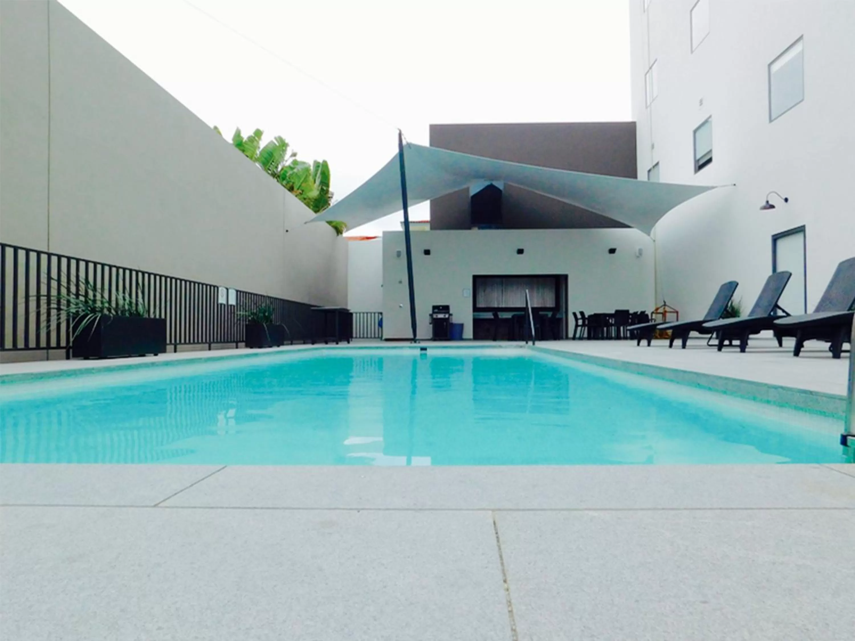 Swimming pool in Staybridge Suites - Villahermosa Tabasco by IHG