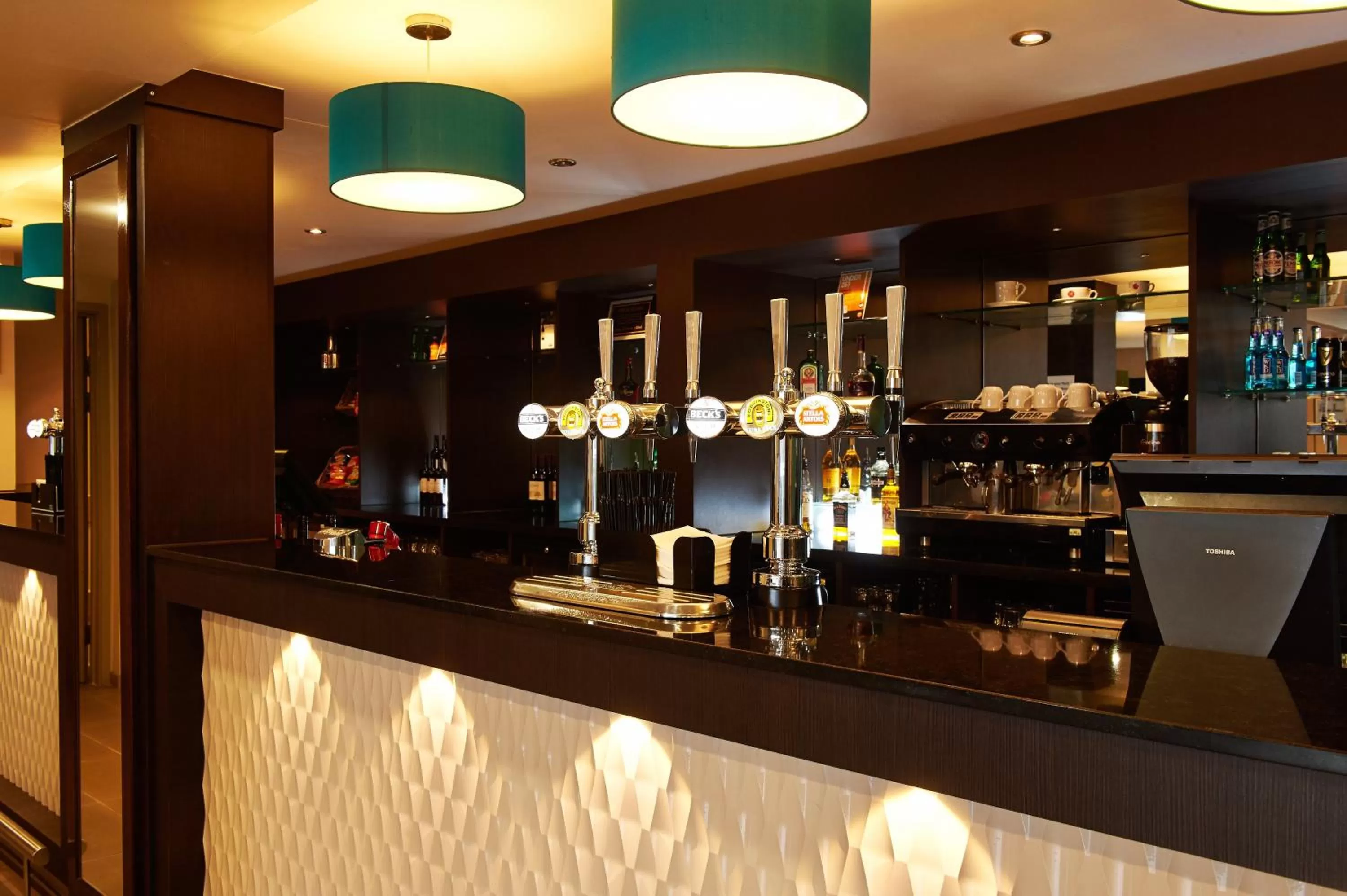 Lounge or bar in Holiday Inn Express Manchester Airport by IHG