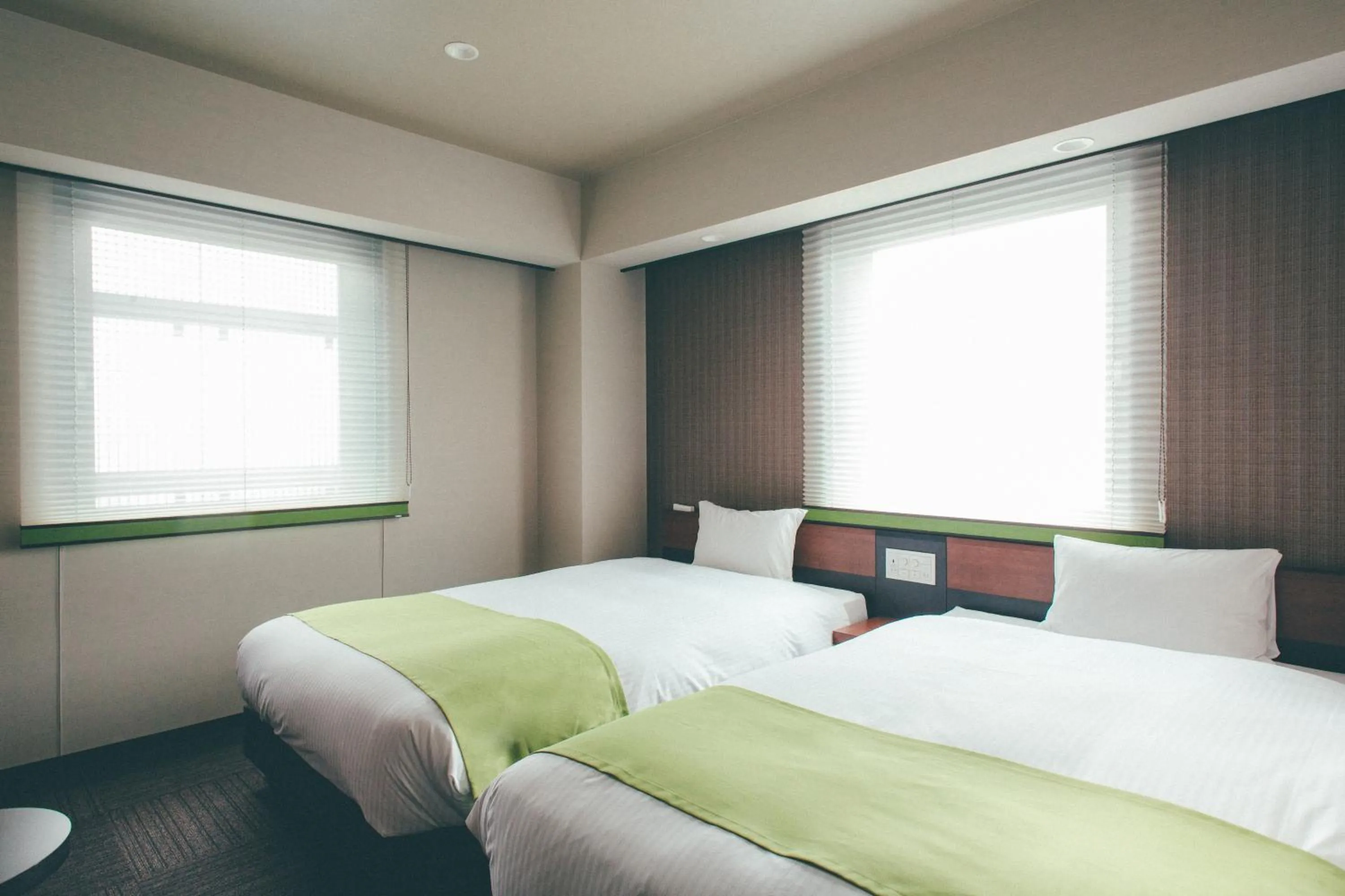 Bed in Hotel Kuretakeso Takayama Ekimae